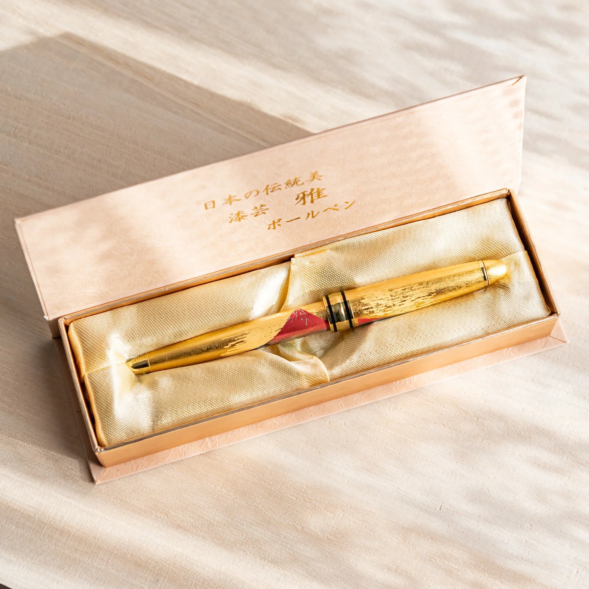 Pen showing Mt. Fuji artwork with gold leaf and traditional composition design displayed clearly composition