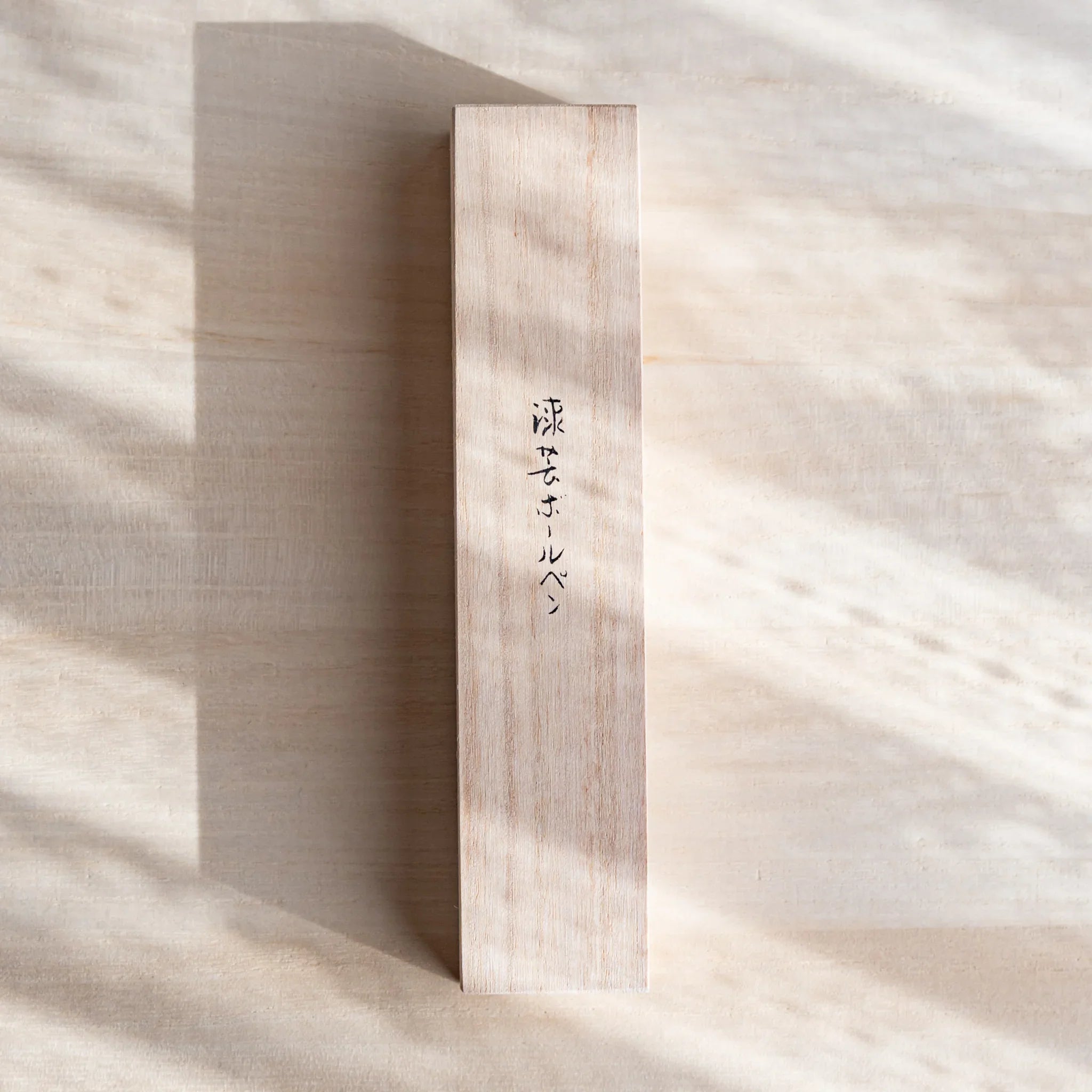 Red Mt.Fuji Yamanaka Retractable Ballpoint Pen, tilted angle revealing structure providing full visual representation and pro