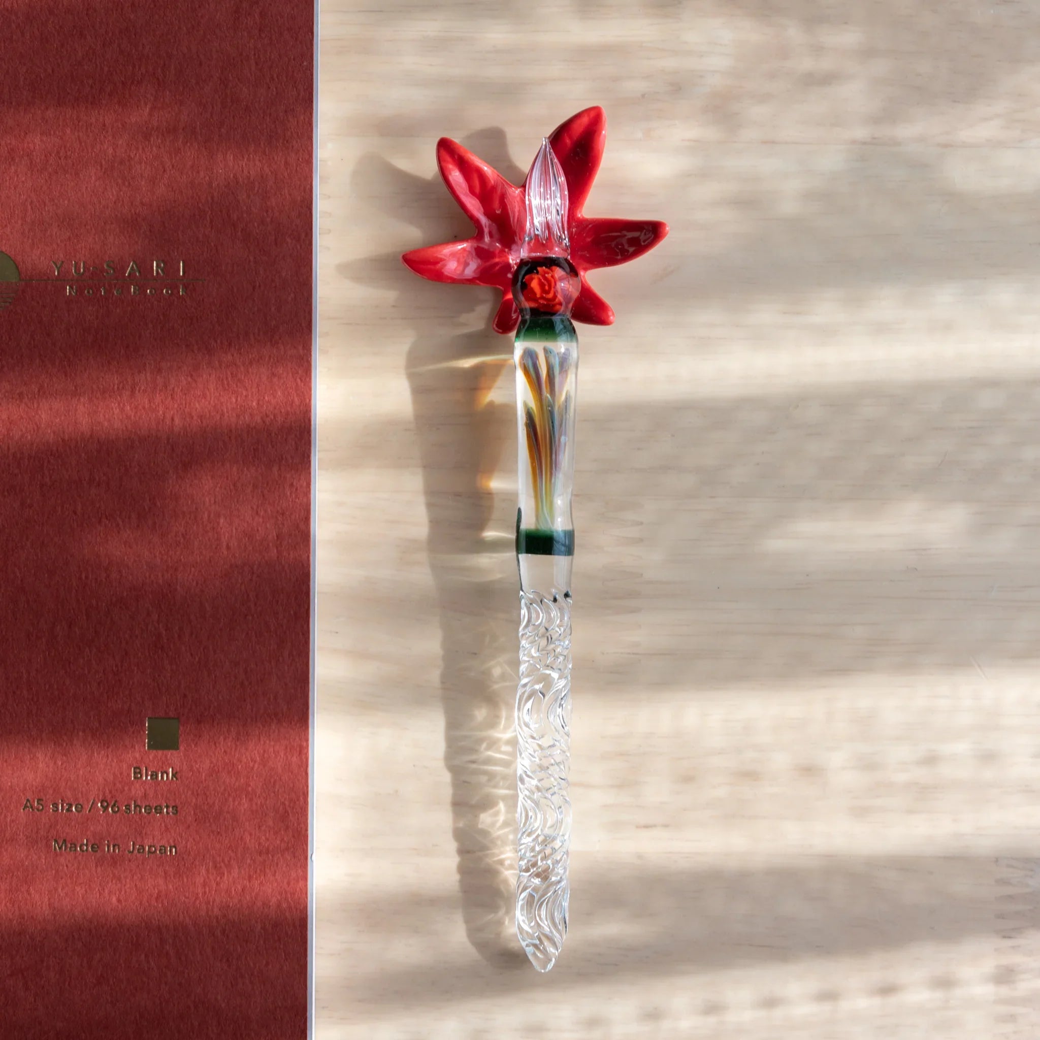 Brown autumn leaf Japanese handcrafted pen rest with traditional fall season color treatment and carved surface detail