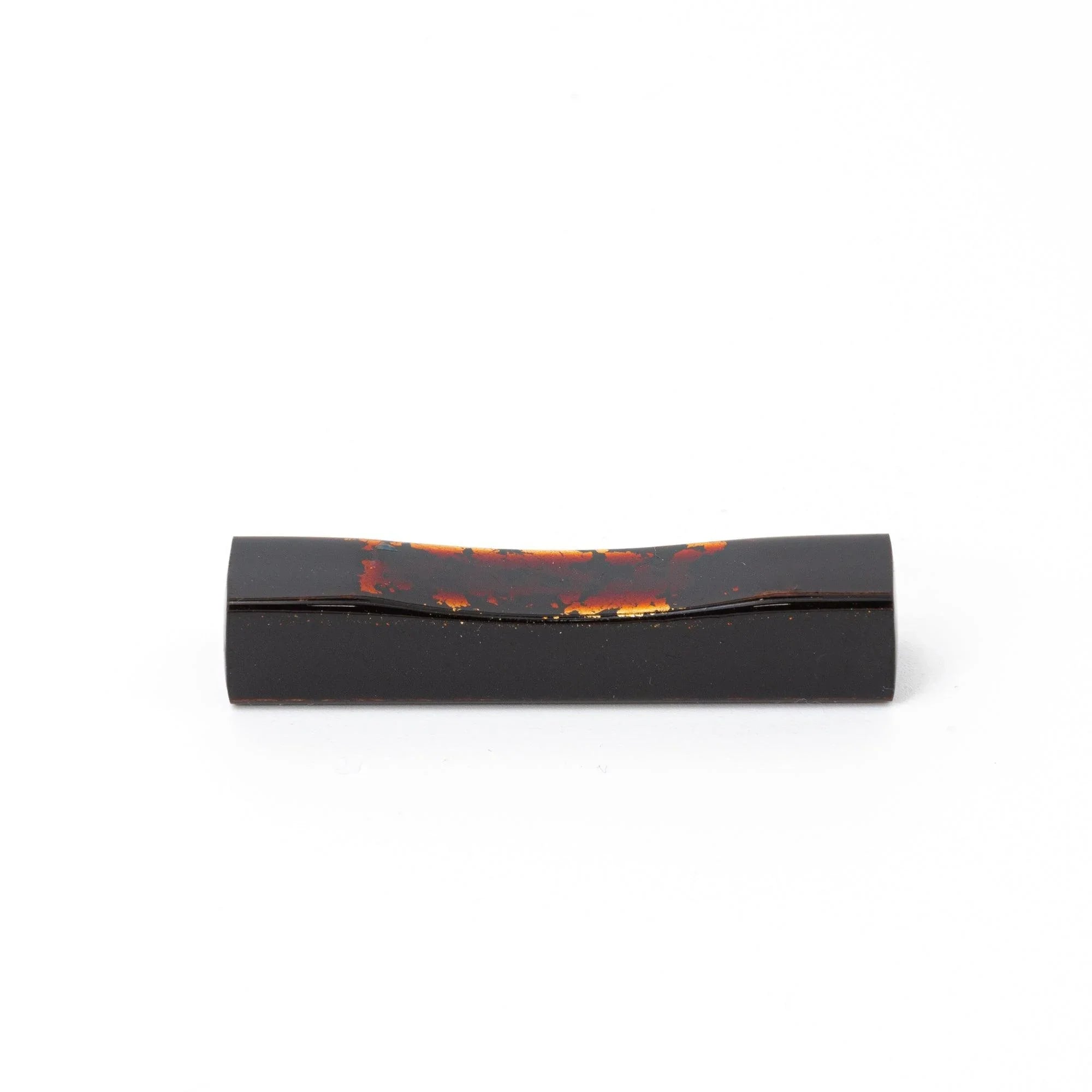 hand-made Echizen black lacquered pen rest from sakura wood with precious gold foil inlay, keeping pens secure during work