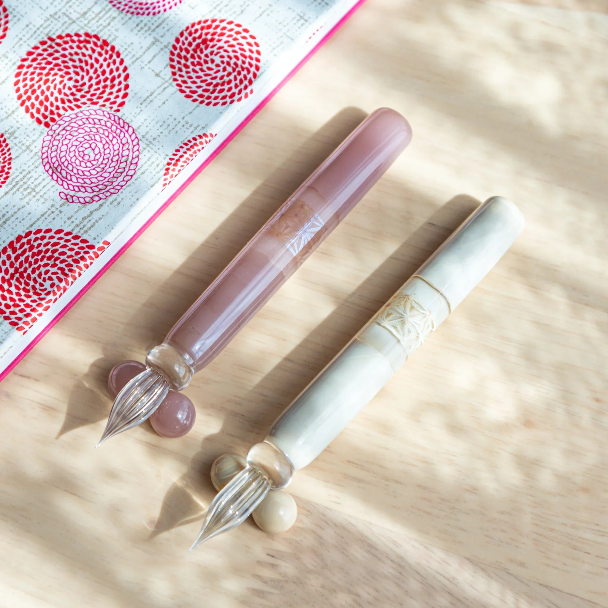 Blush pink hemp leaves glass dip pen complete set with wooden pen rests in feminine composition, Japanese glass pen