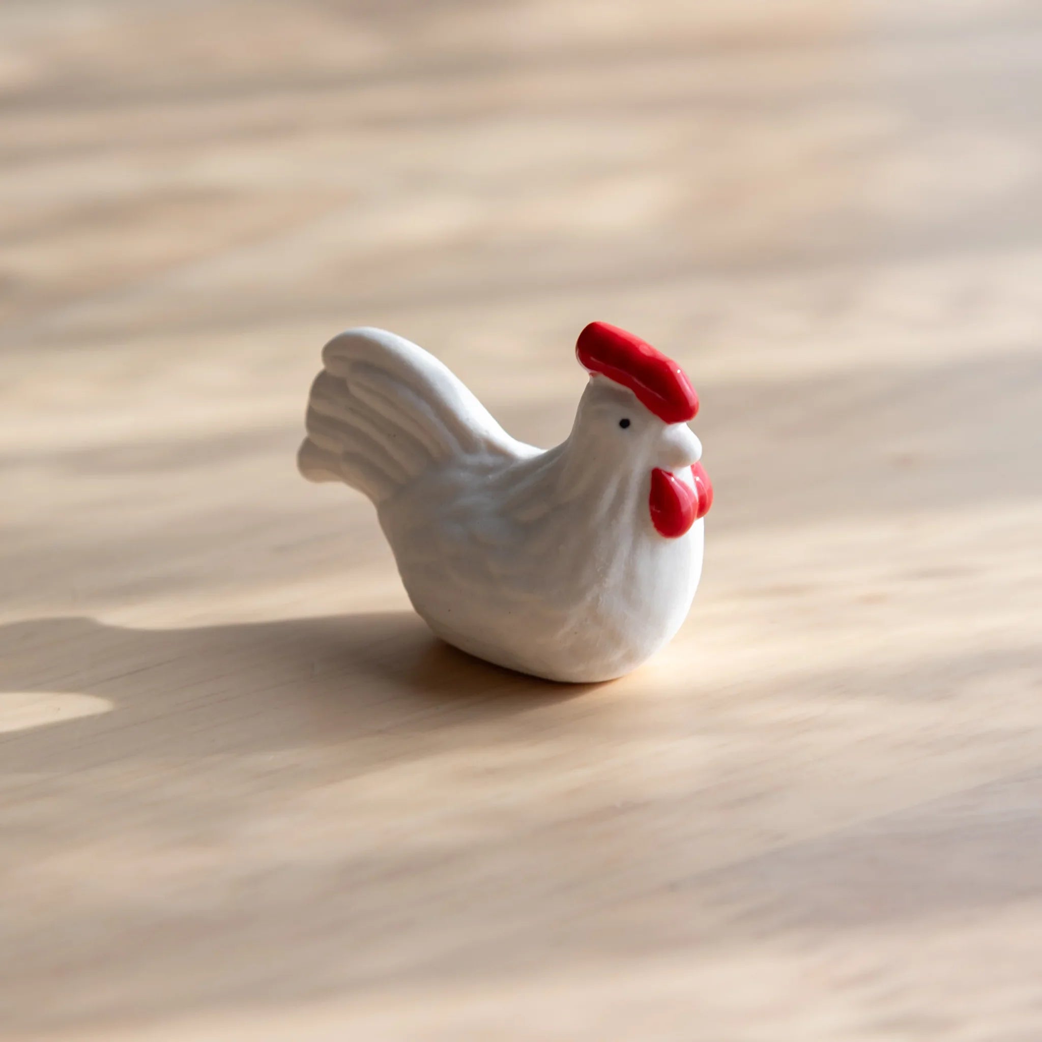 Chabo rooster ceramic pen rest handcrafted Japanese with traditional bird shape close shot