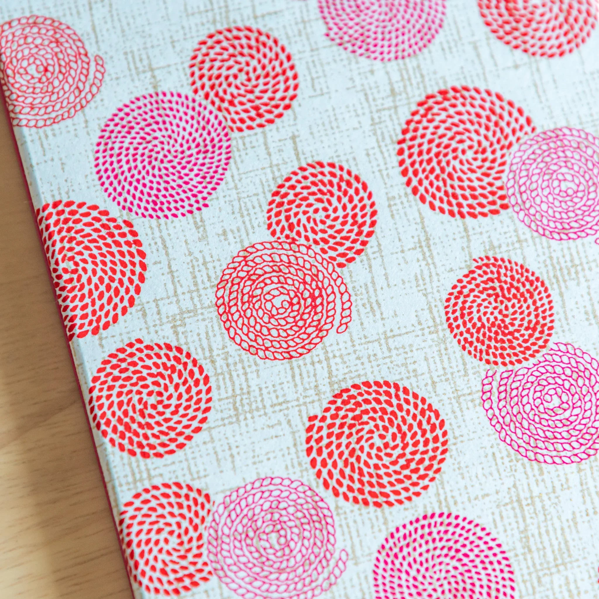 Interior pages of Circle of Blossoms goshuincho fanned showing white paper and page quantity and white interior space