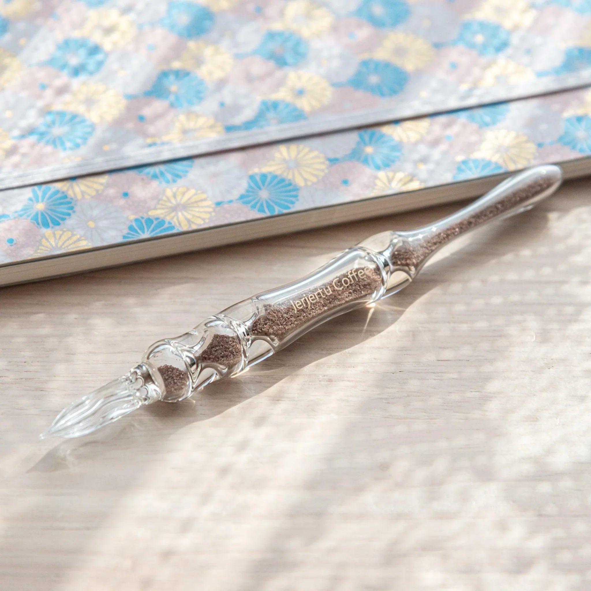 Coffee Hourglass Glass Dip Pen with brown-toned glass chambers and visible coffee-color resin in three-chamber design