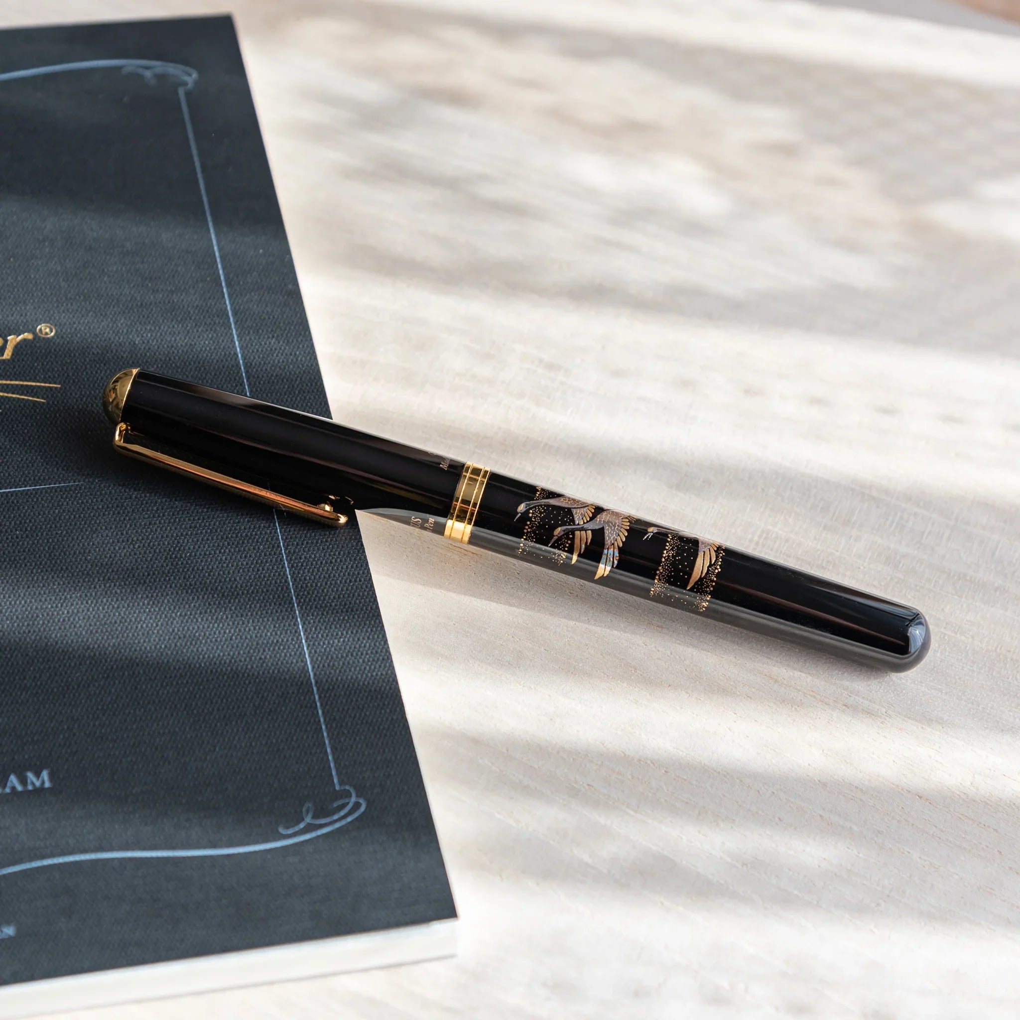 Crane Yamanaka fountain pen with lacquer design shown in composition in detailed composition product composition view