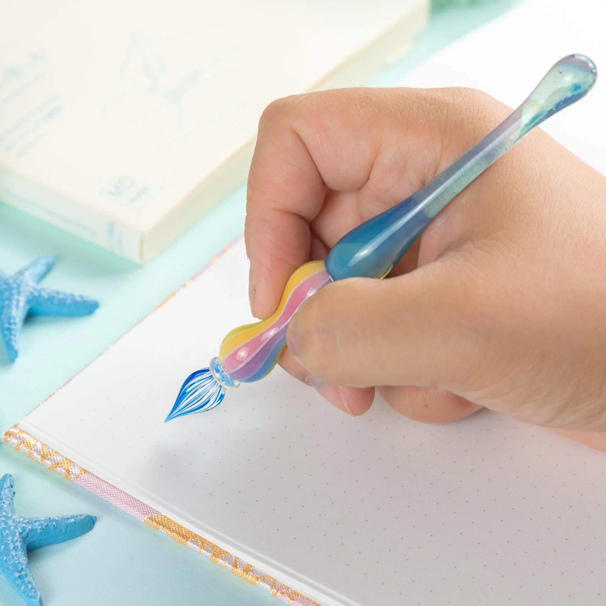 Dreamy Rainbow Marin glass dip pen positioned upright showing full barrel and bulbous balloon design