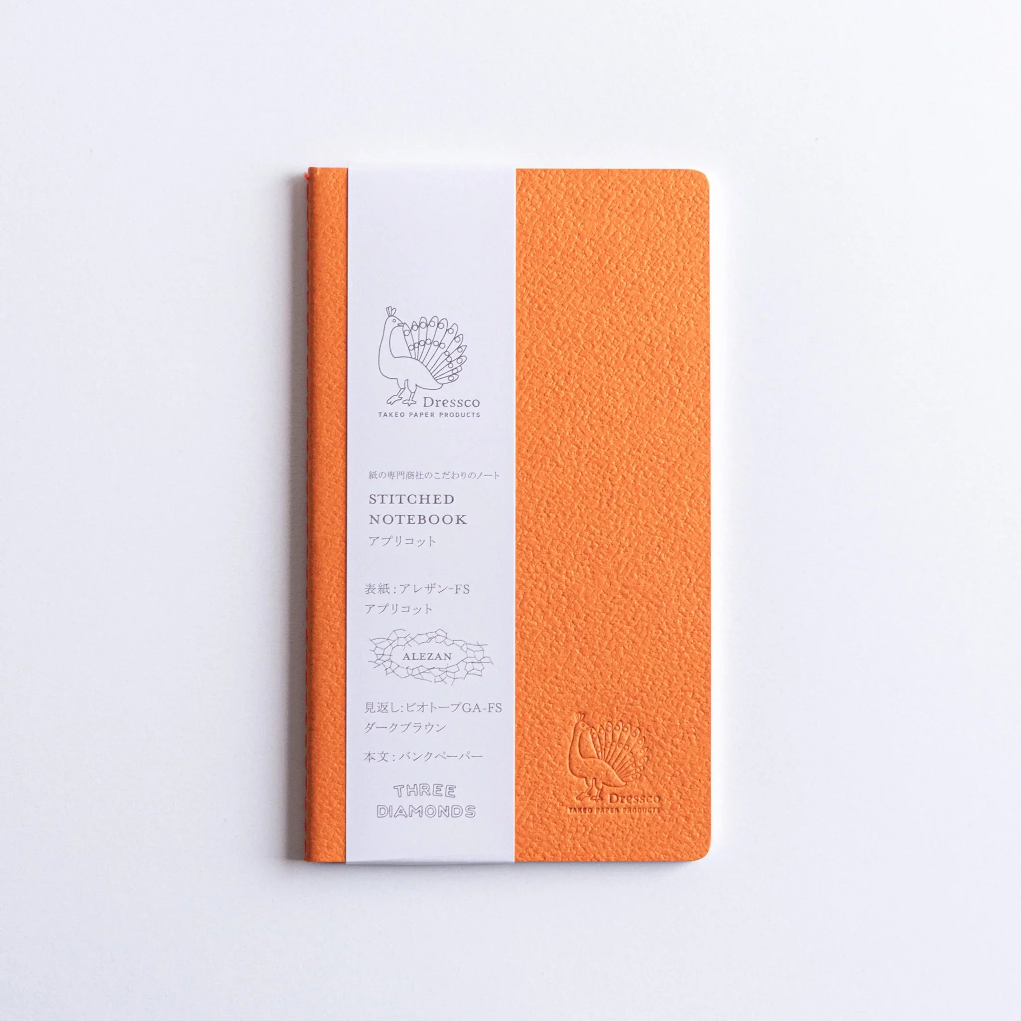 Charcoal gray textured fabric cover of A6 Dressco Bank Ledger Paper stitched notebook with embossed bird logo design