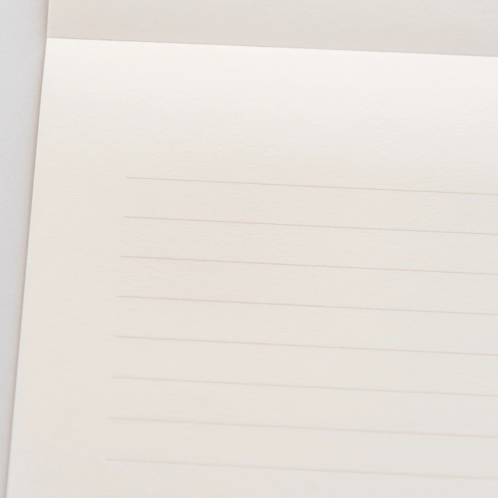 Dressco bank ledger paper A6 notebook, side profile showing page thickness and binding, Japanese Dressco passbook format