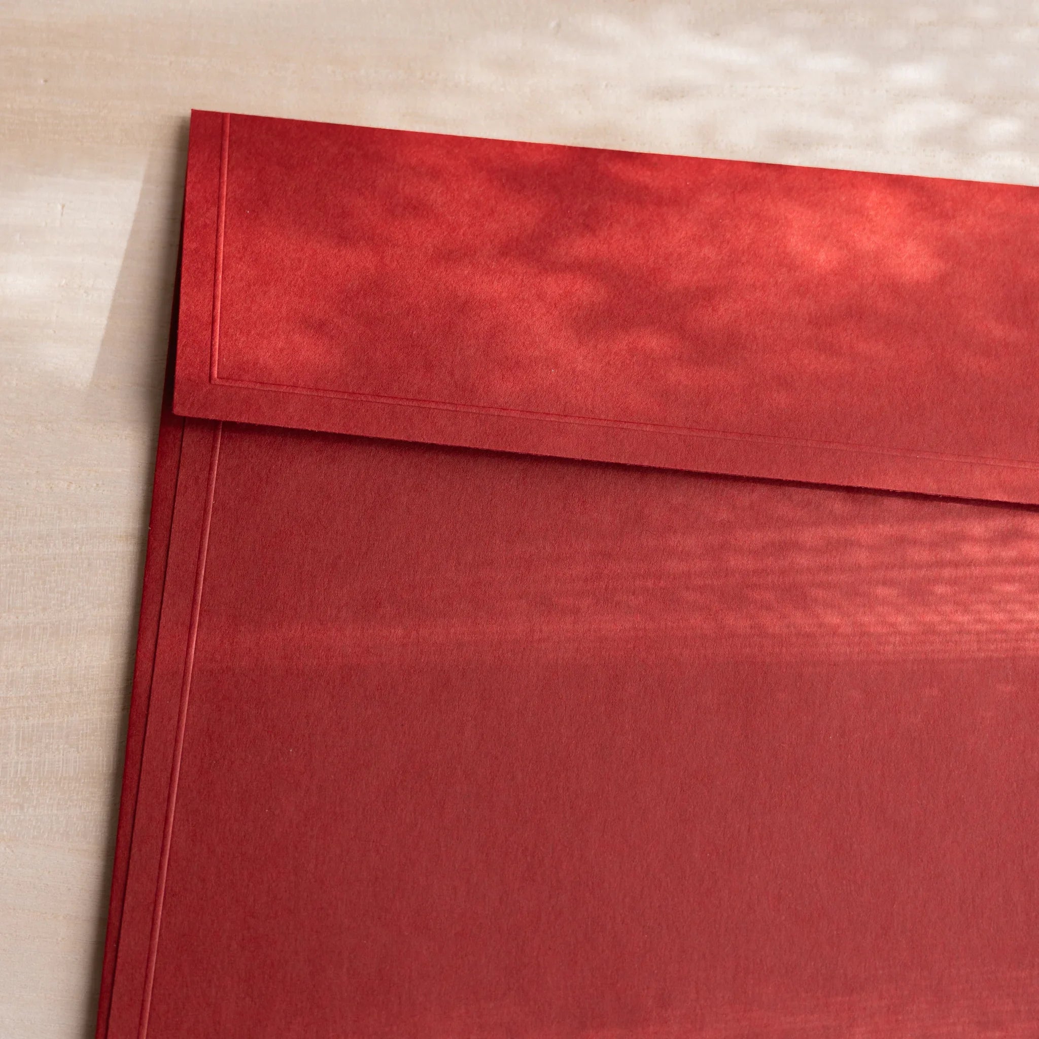Dressco ivory large embossed envelope image eighty-three, left angled side view, with embossed finish, set of three