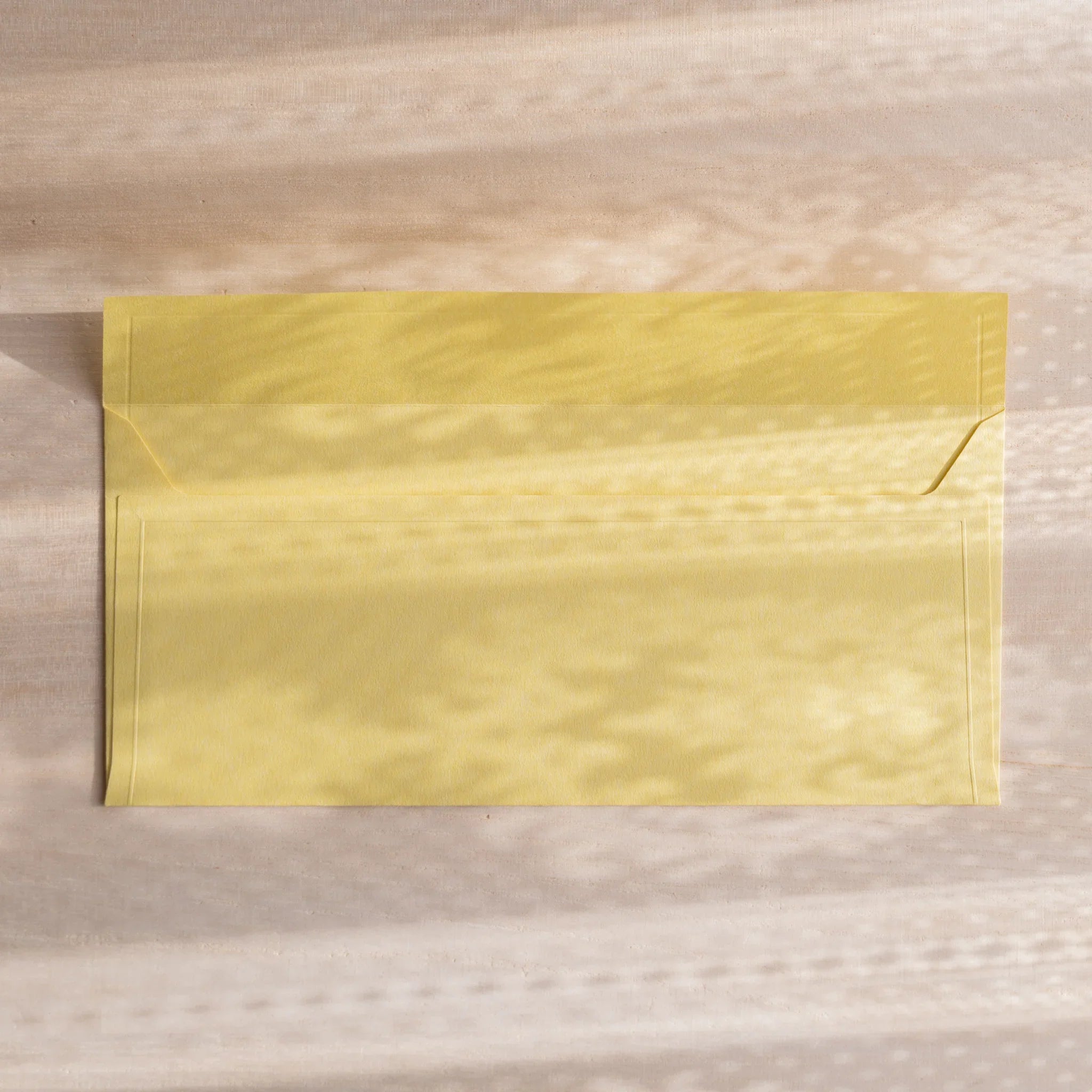 Dressco ivory medium embossed envelope image twenty-nine, fanned display layout, with embossed paper, set of three