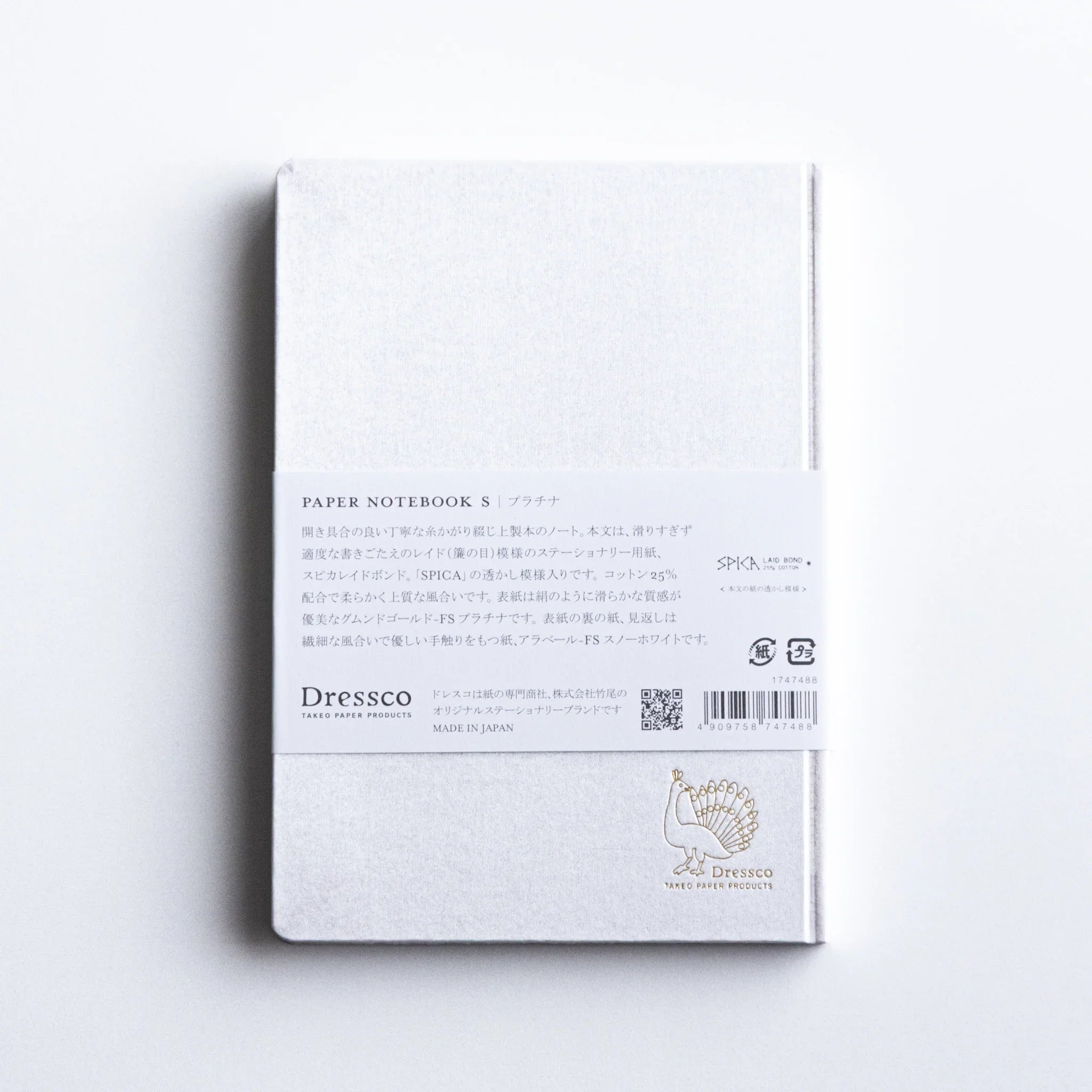 Dressco Spica Laid Bond Paper A6 notebook pages open showing the laid bond paper texture and interior ruled surface
