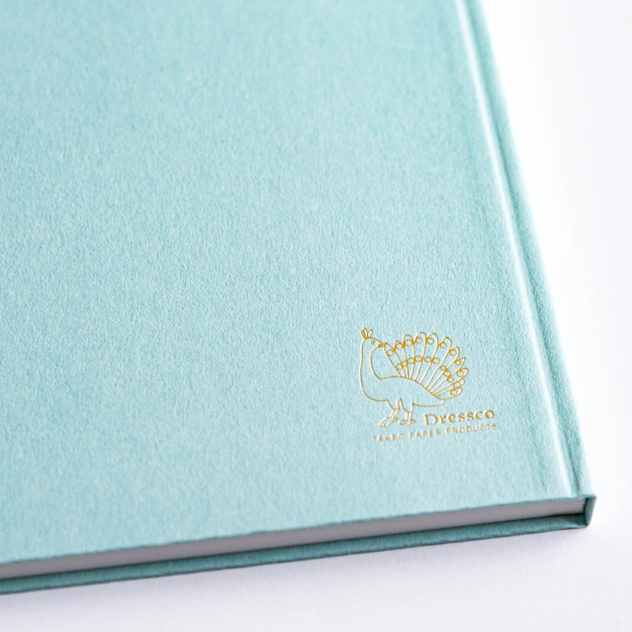 Flat lay of Dressco Spica Laid Bond Paper B6 notebook showing full cover dimensions and the bond paper design style