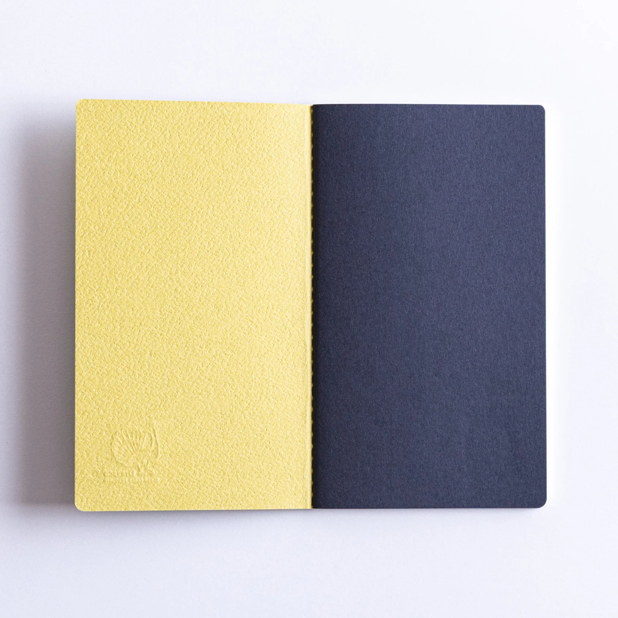 Front cover view of Dressco Spica Laid Bond Stitched A6 notebook showing full cover design and notebook proportions