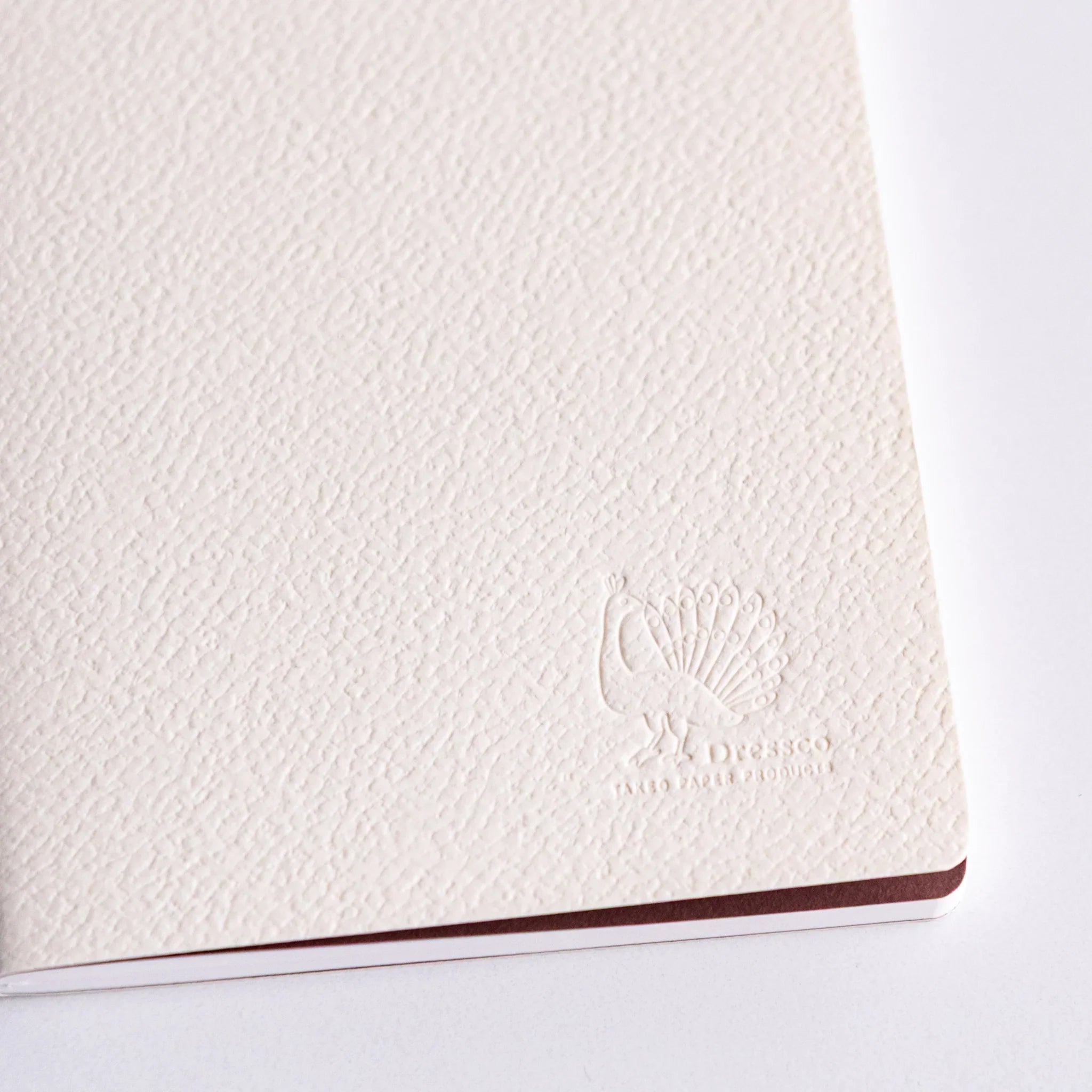 Dressco notebook collection with case, of four with product display highlighting raised texture