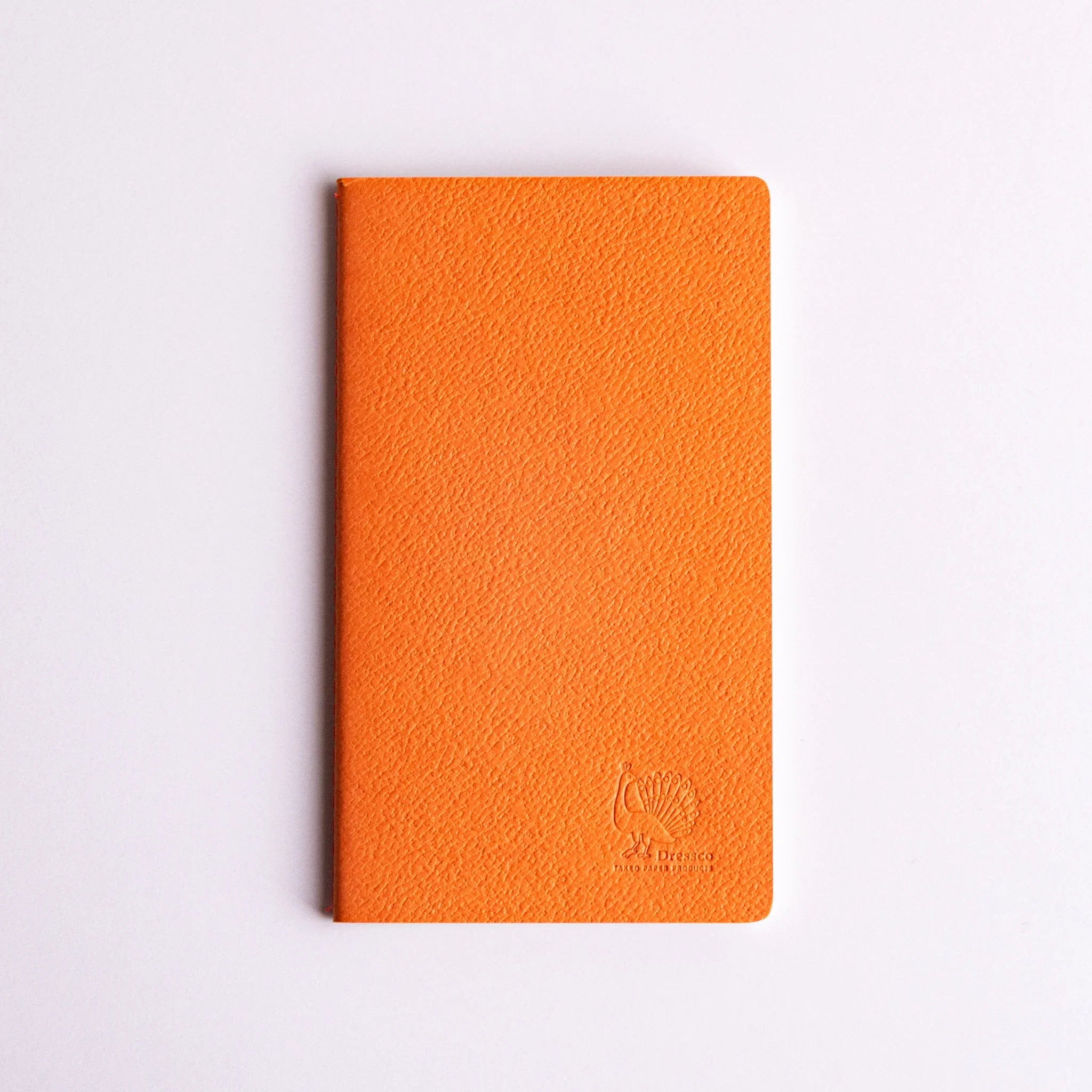 Dressco notebook collection with case, four notebooks with composed view highlighting binding quality