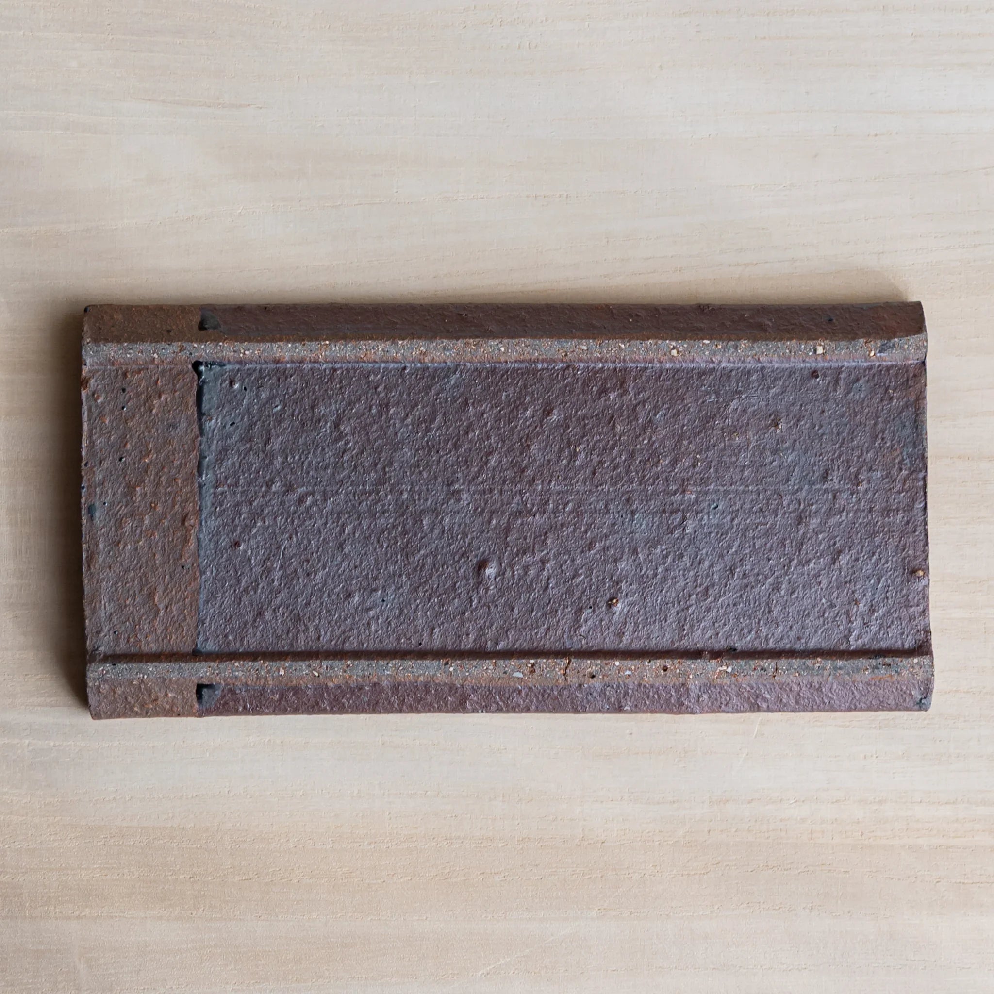 Echizen Kawara red tile ceramic pen tray with four slots shown in composition detail in composition detail
