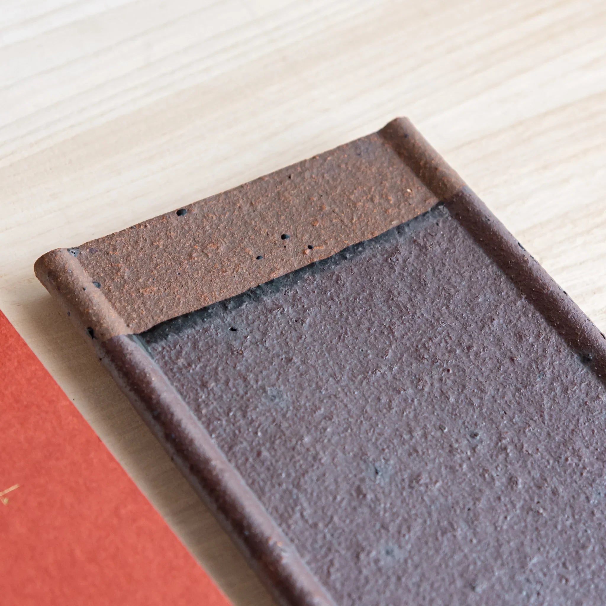 Echizen Kawara red tile ceramic pen tray with four slots shown in composition detail shown composition