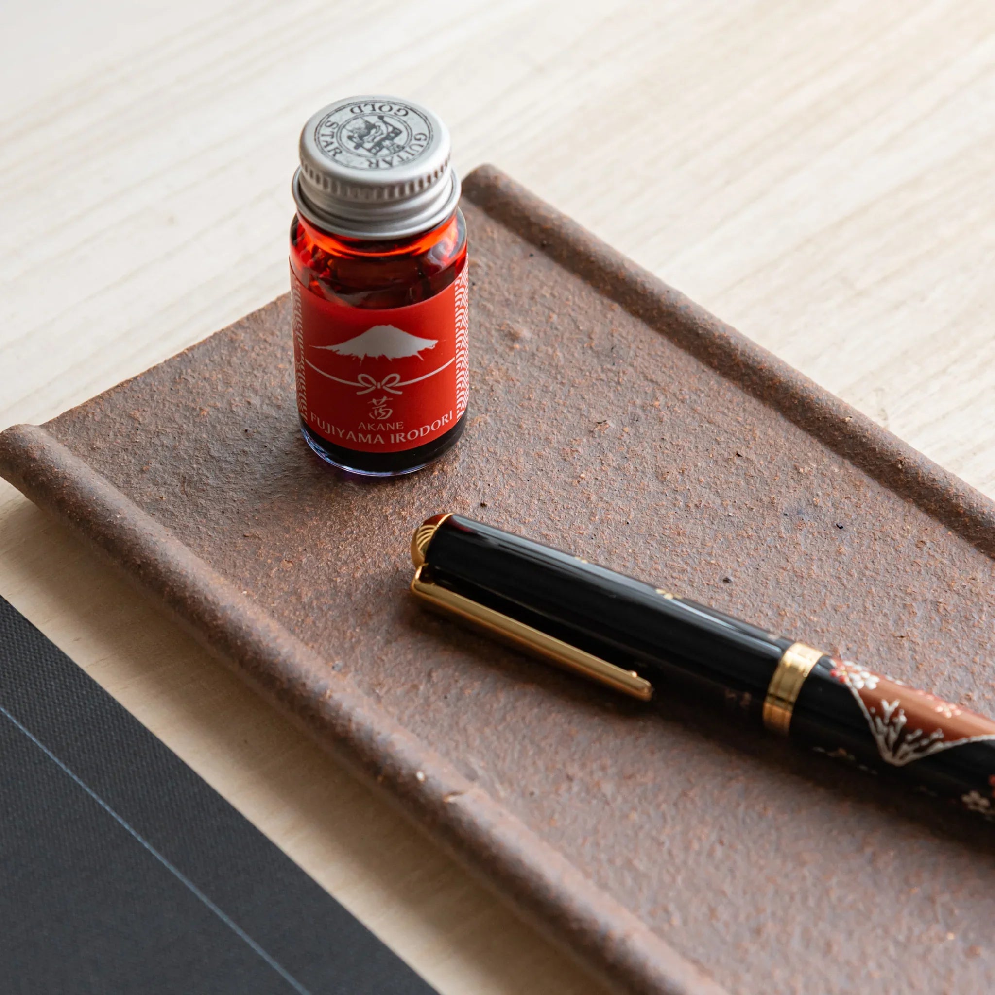 Echizen Kawara yakishime clay ceramic pen tray with four slots shown in composition detail in composition view