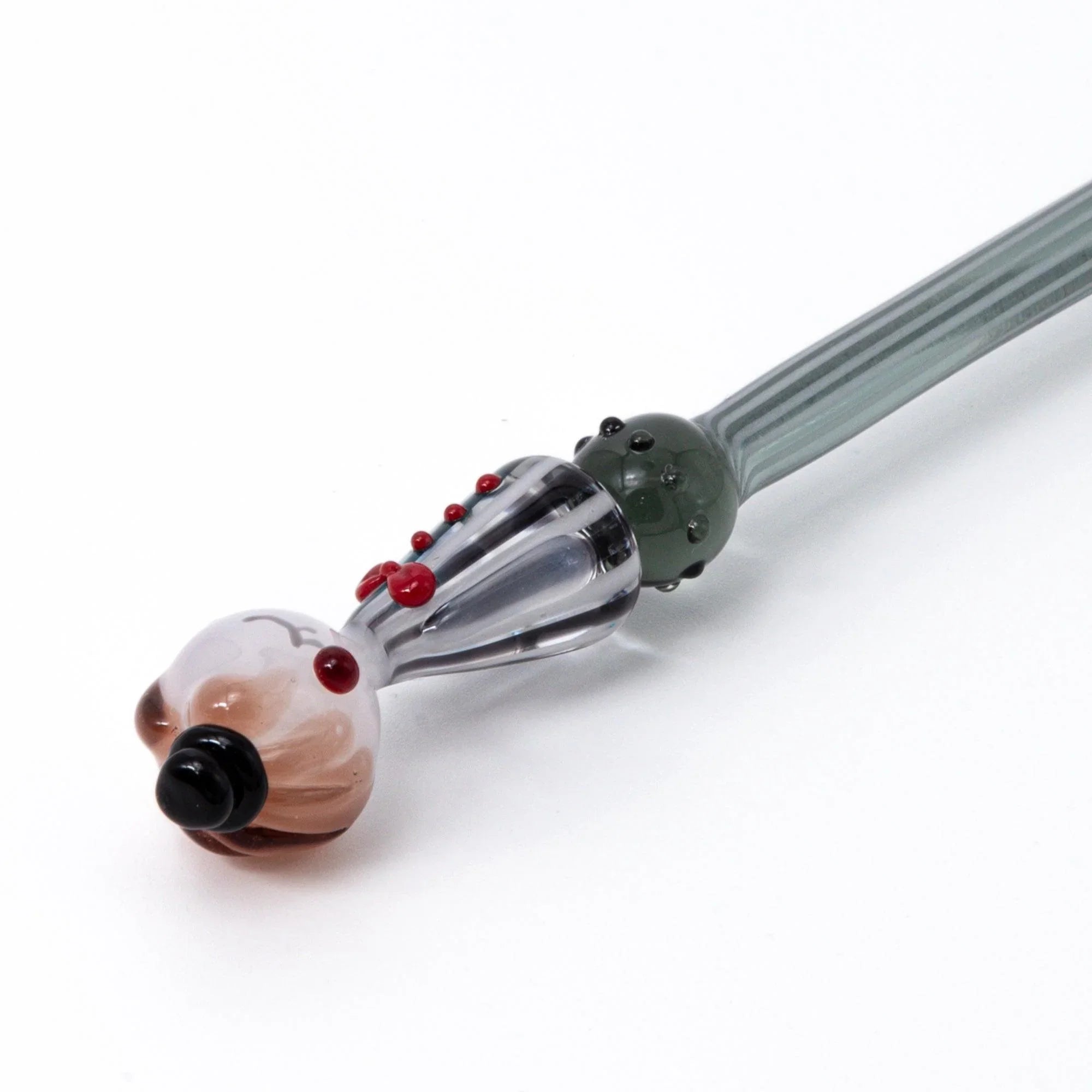 Moga-Chan glass dip pen displaying red dress vintage female character and striped glass composition with handle detail and
