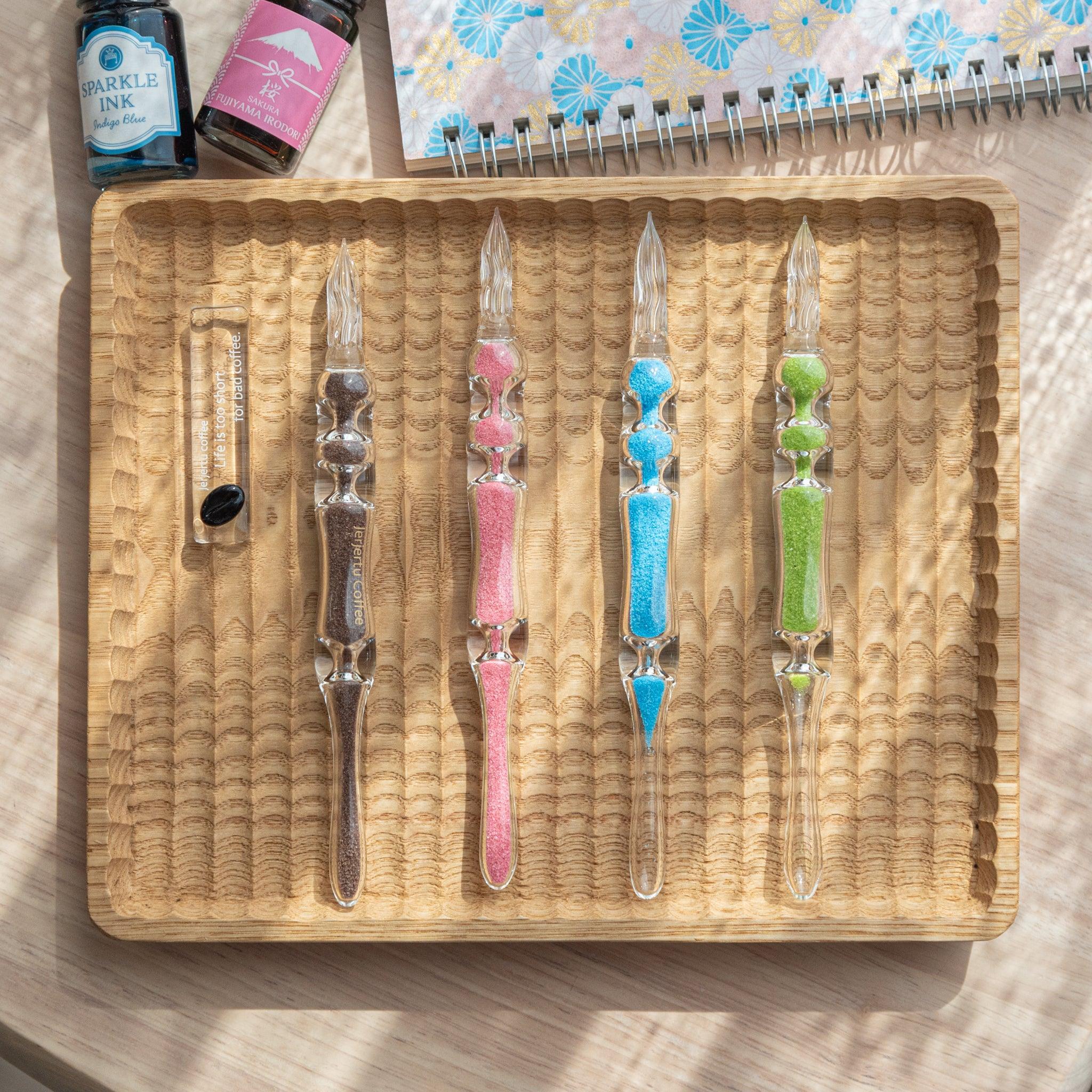 Fresh Green Hourglass Glass Dip Pen top angle showing green-pigmented glass sections in hourglass with pointed nib