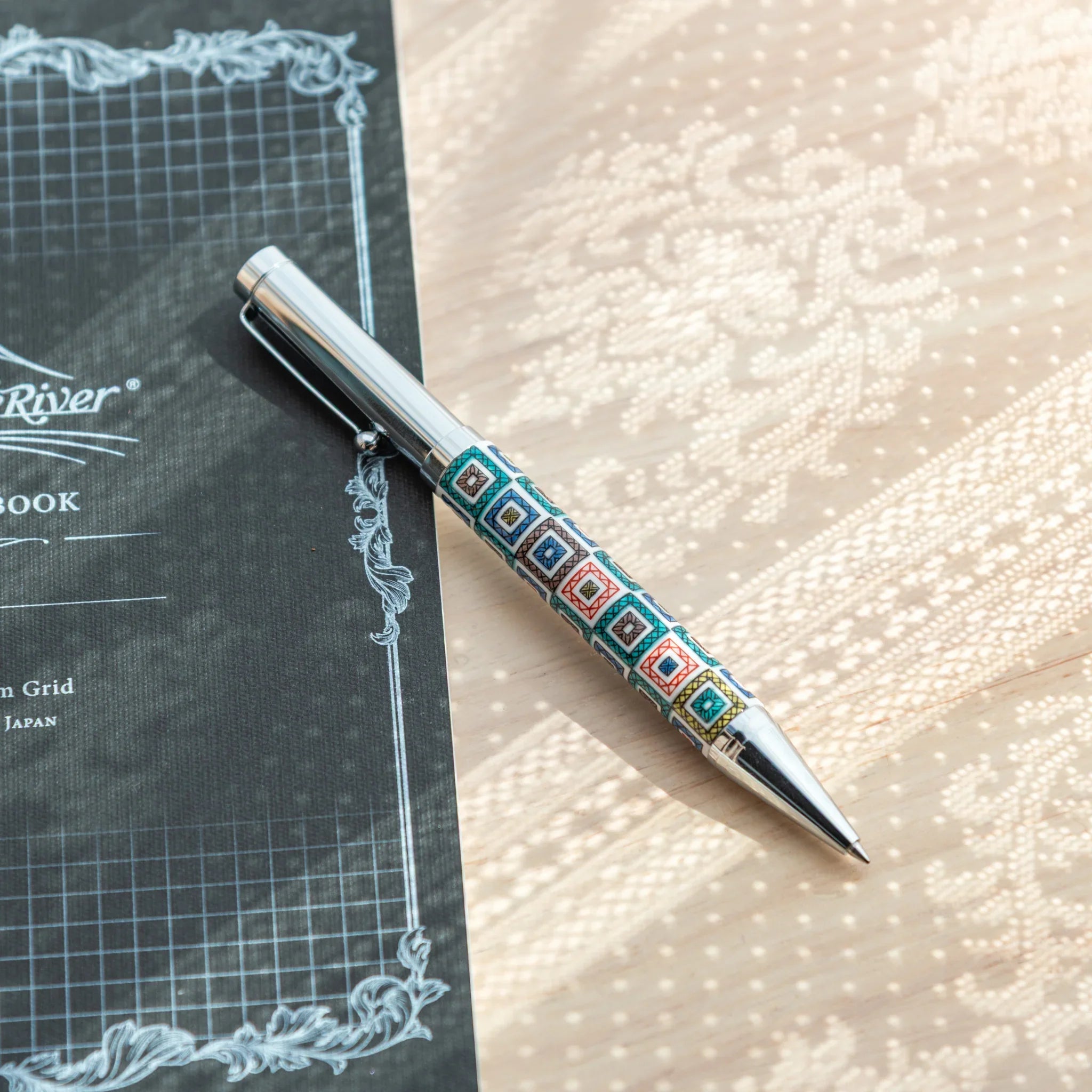 Kutani ceramic ballpoint pen with geometric tile pattern in classic Japanese porcelain style featuring traditional