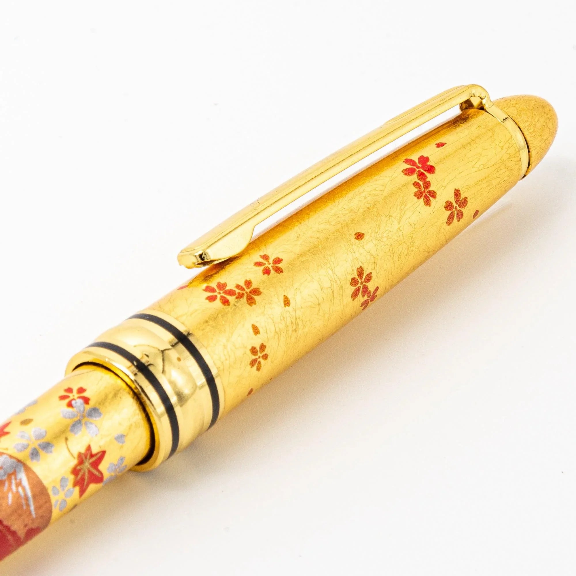Full-length Japanese Fan Makie ballpoint pen showing traditional sensu folding fan in delicate gold makie