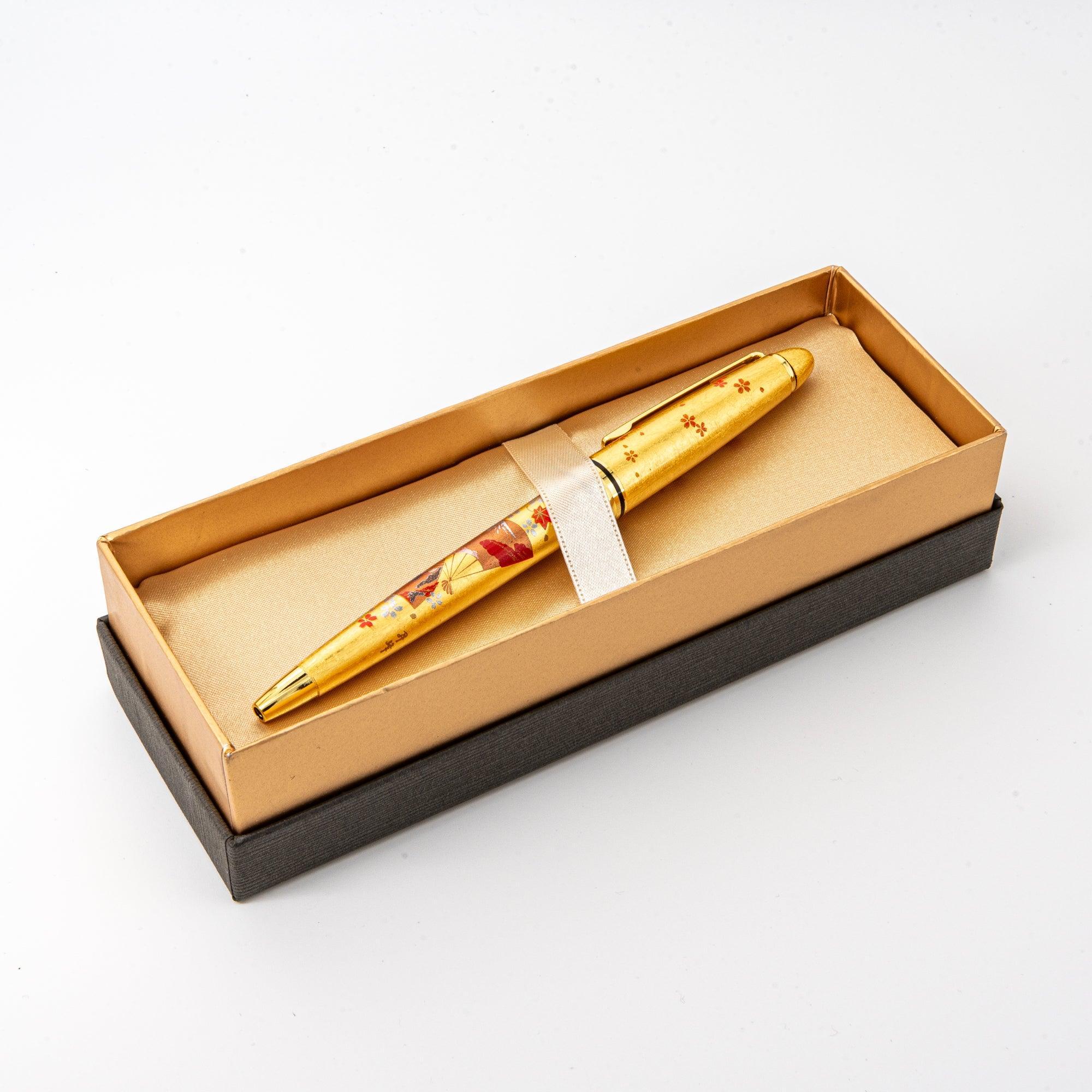 Capped and uncapped Gold Leaf Japanese Fan Makie ballpoint pen comparison showing fan decoration details