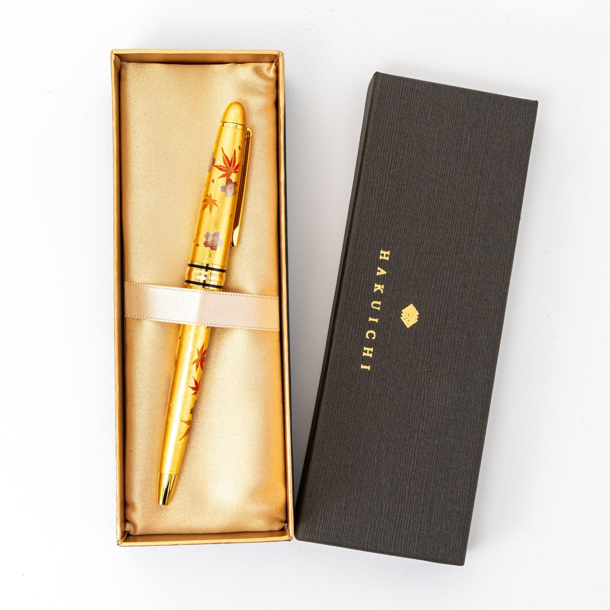 Horizontal display Gold Leaf Sakura and Momiji ballpoint with black finish and mixed spring autumn design
