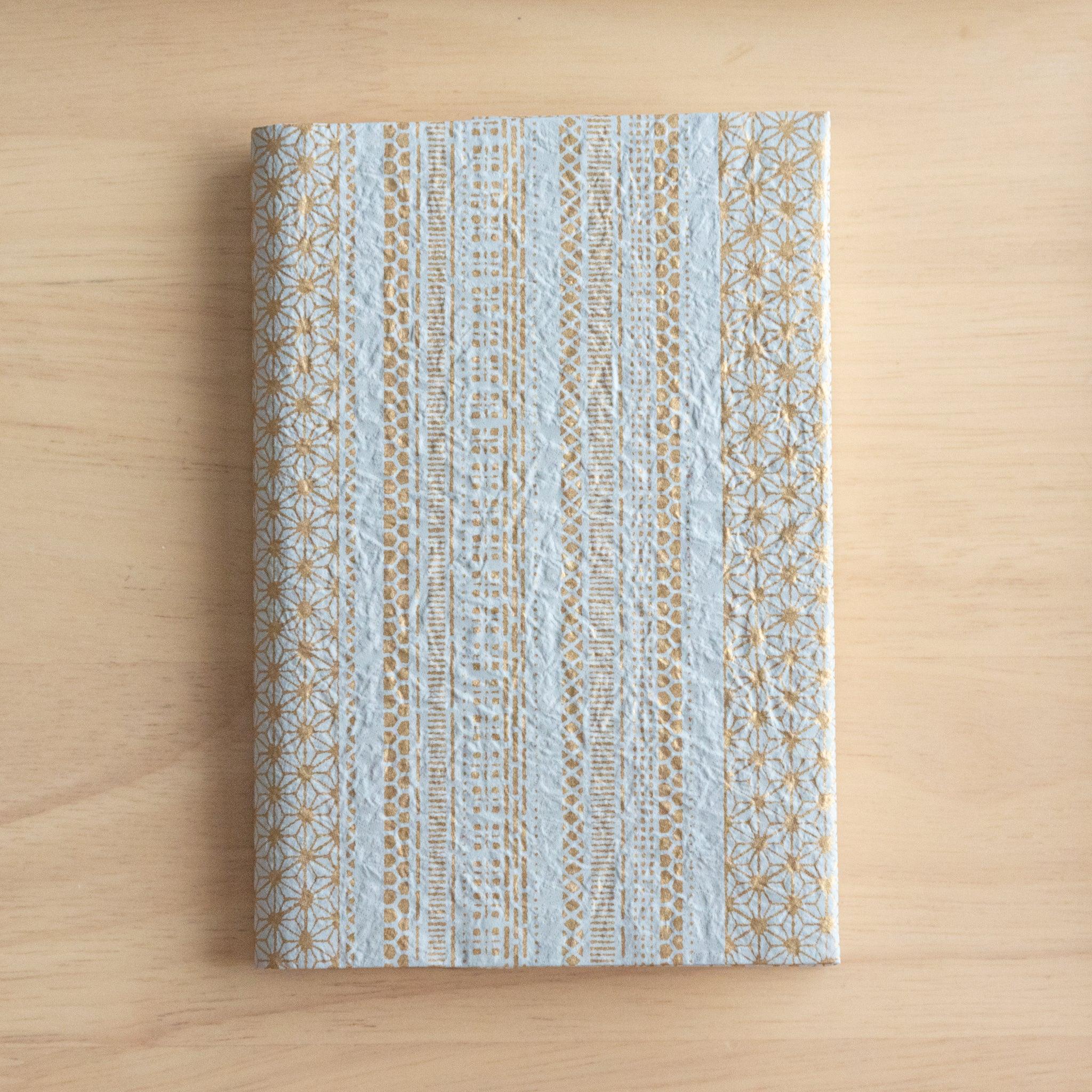Golden Japanese Traditional Pattern Hand-Dyed Yuzen Washi Book Cover (A6), front view with product styling