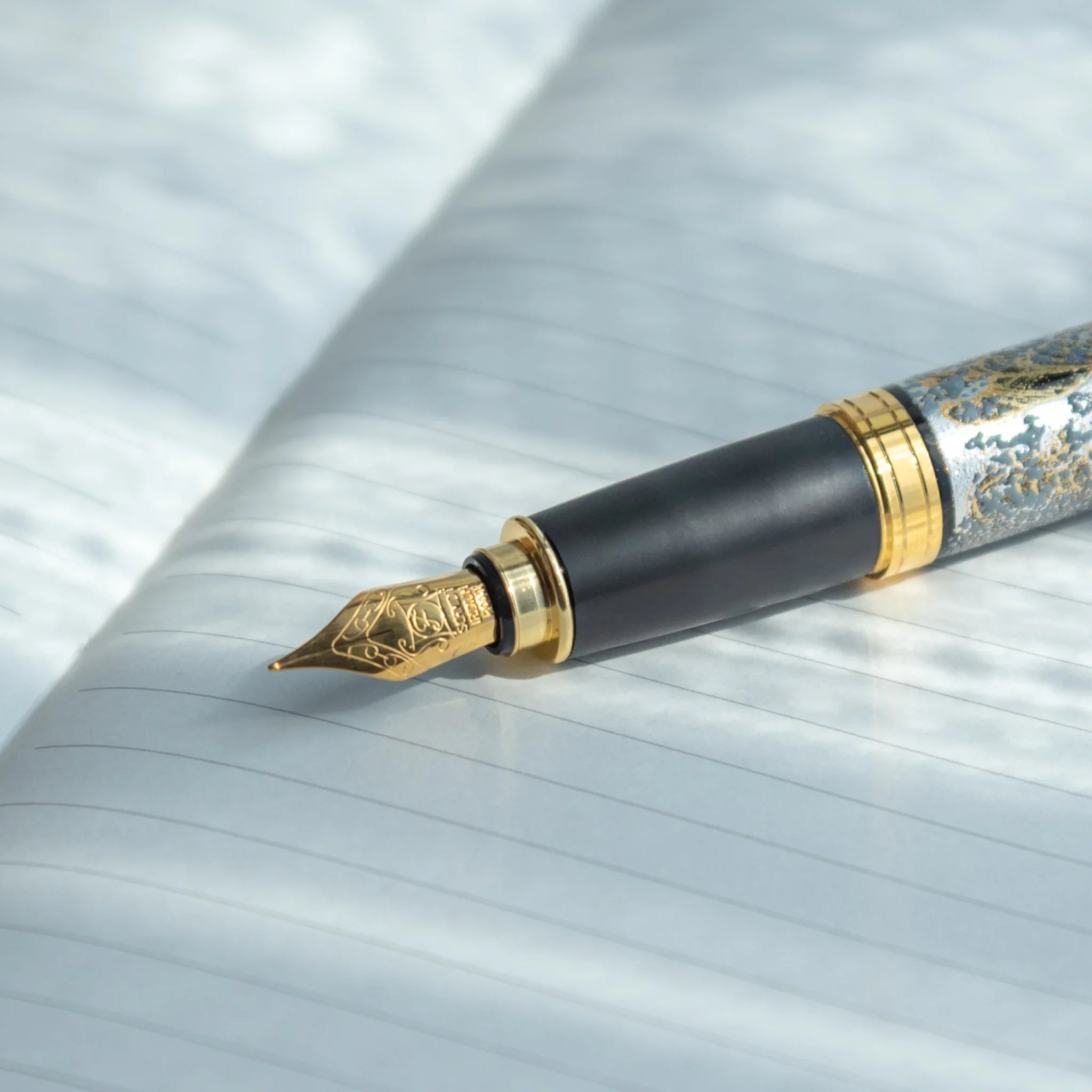 Blue lacquer Yamanaka fountain pen features detailed ocean wave and Mount Fuji landscape design for writing