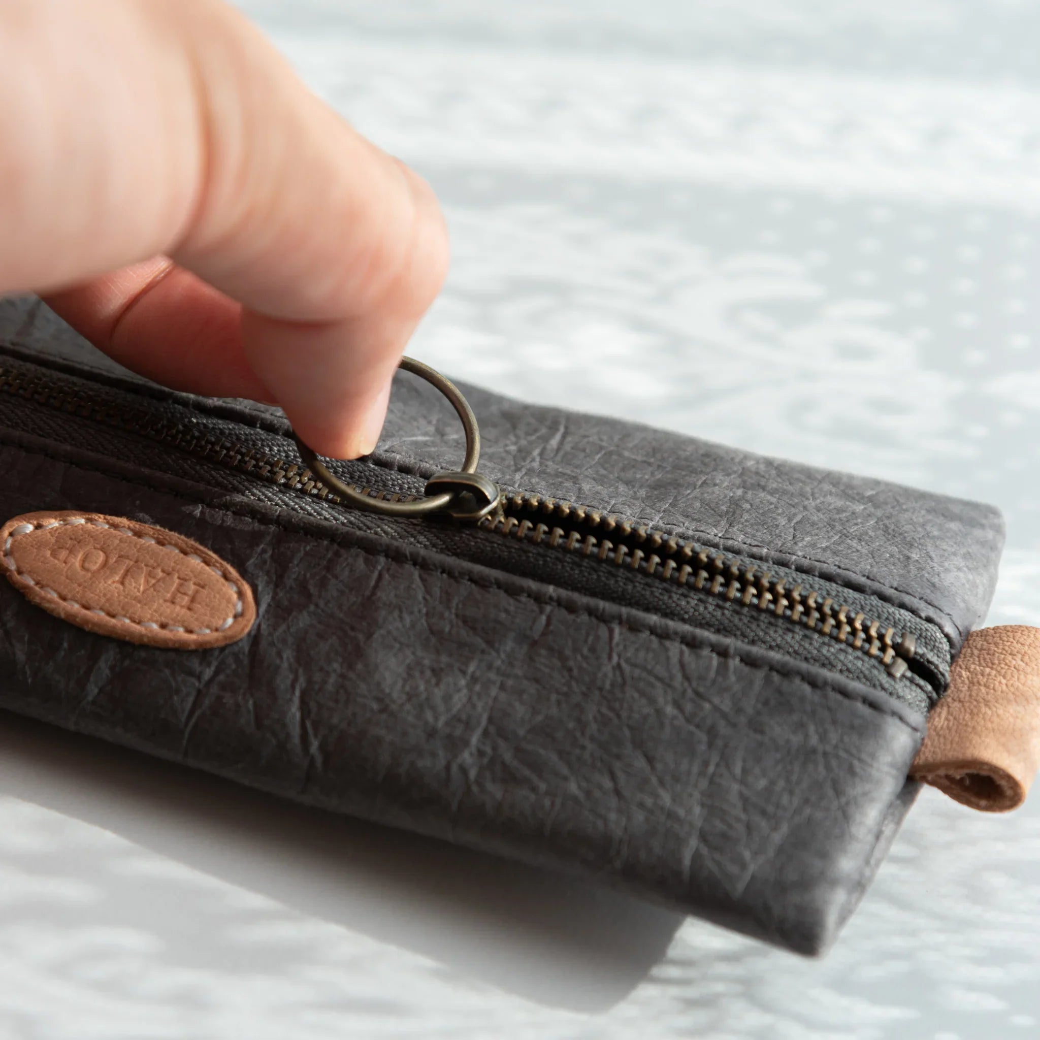 Washi paper pen case in gray flat lay on neutral surface showing form displayed clearly with traditional construction