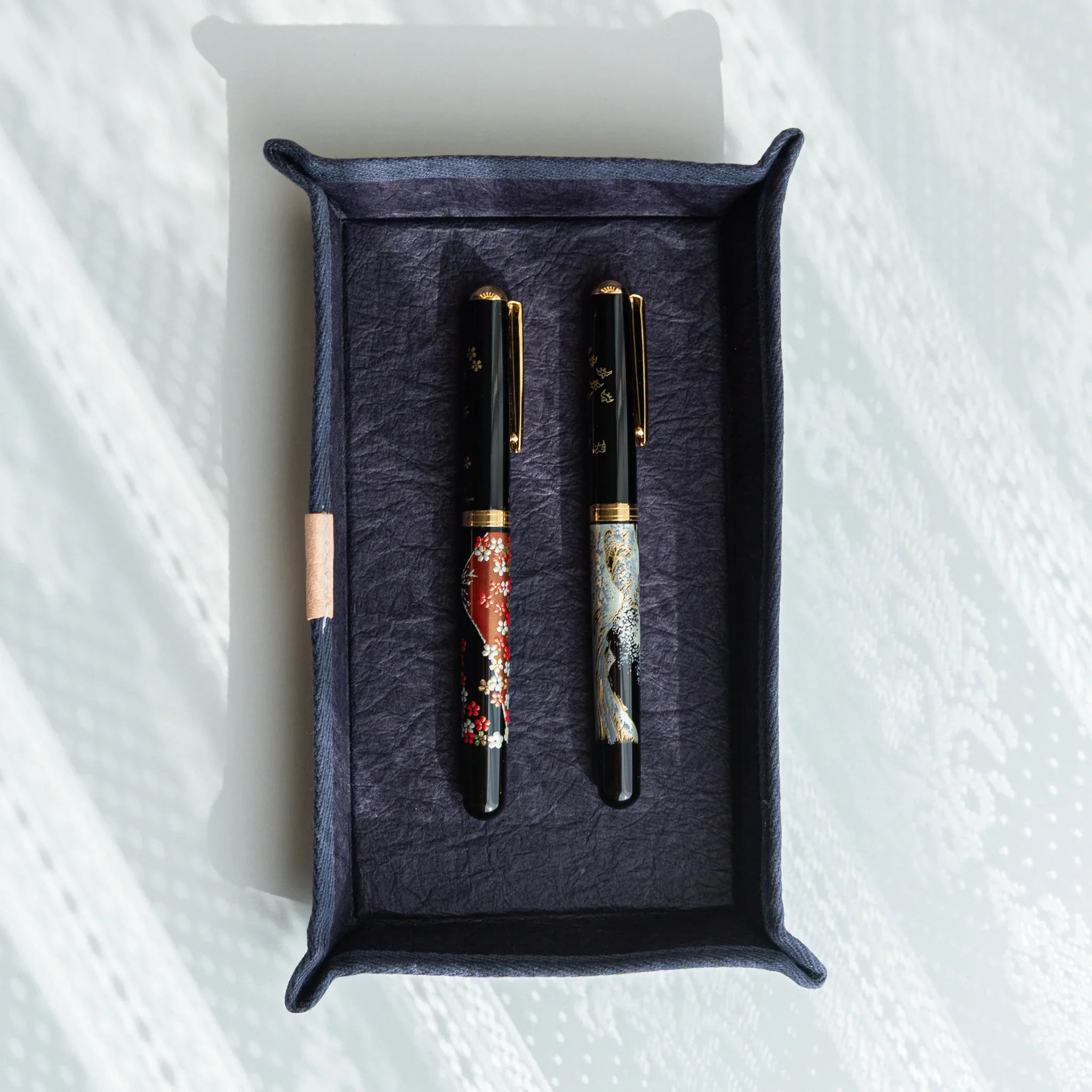 Handcrafted Sugihara Washi Paper Pen Tray purple angled view showing washi paper covering and tray sides
