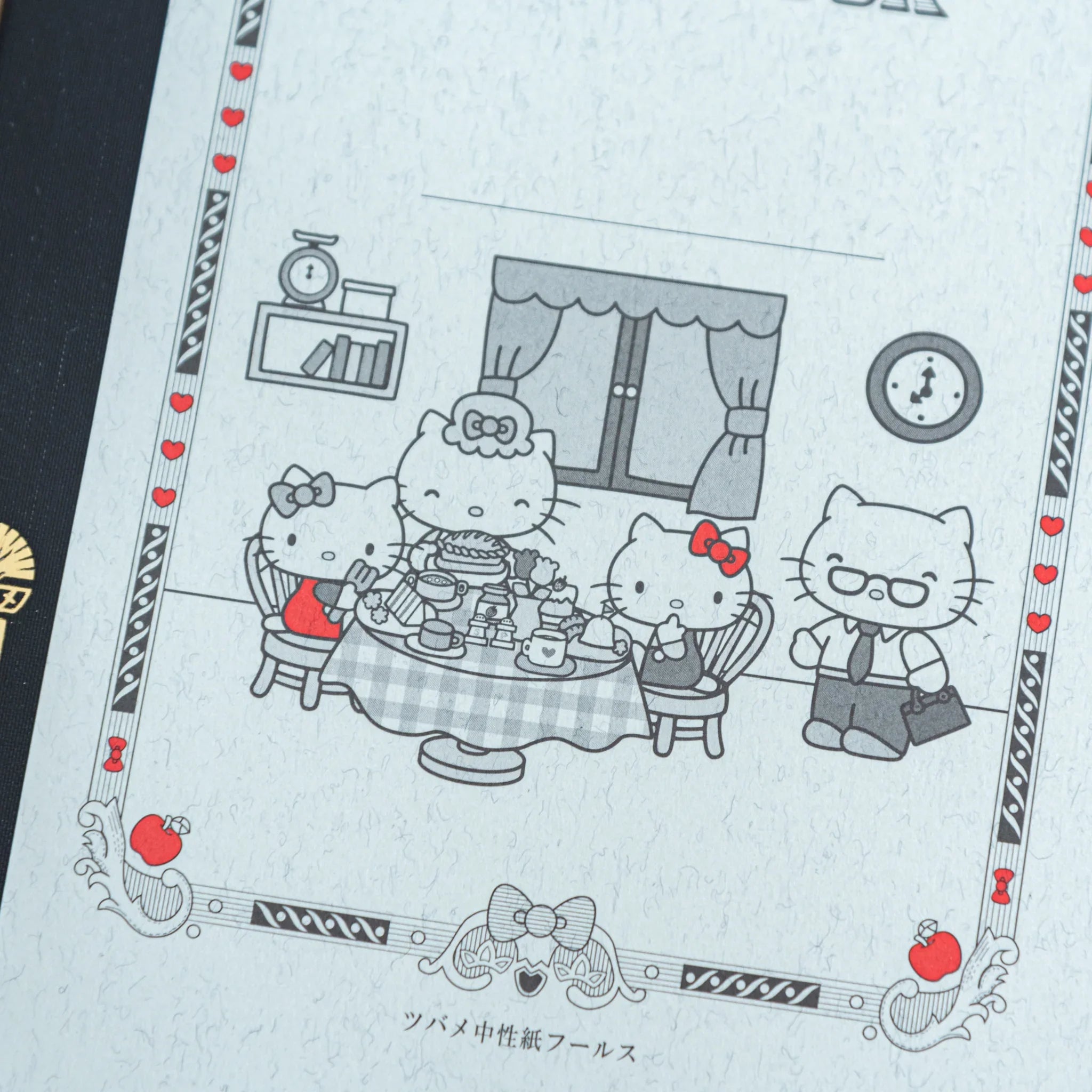Hello Kitty Tsubame Foold Notebook Grid A5 showing interior blue grid paper pages from opened notebook position