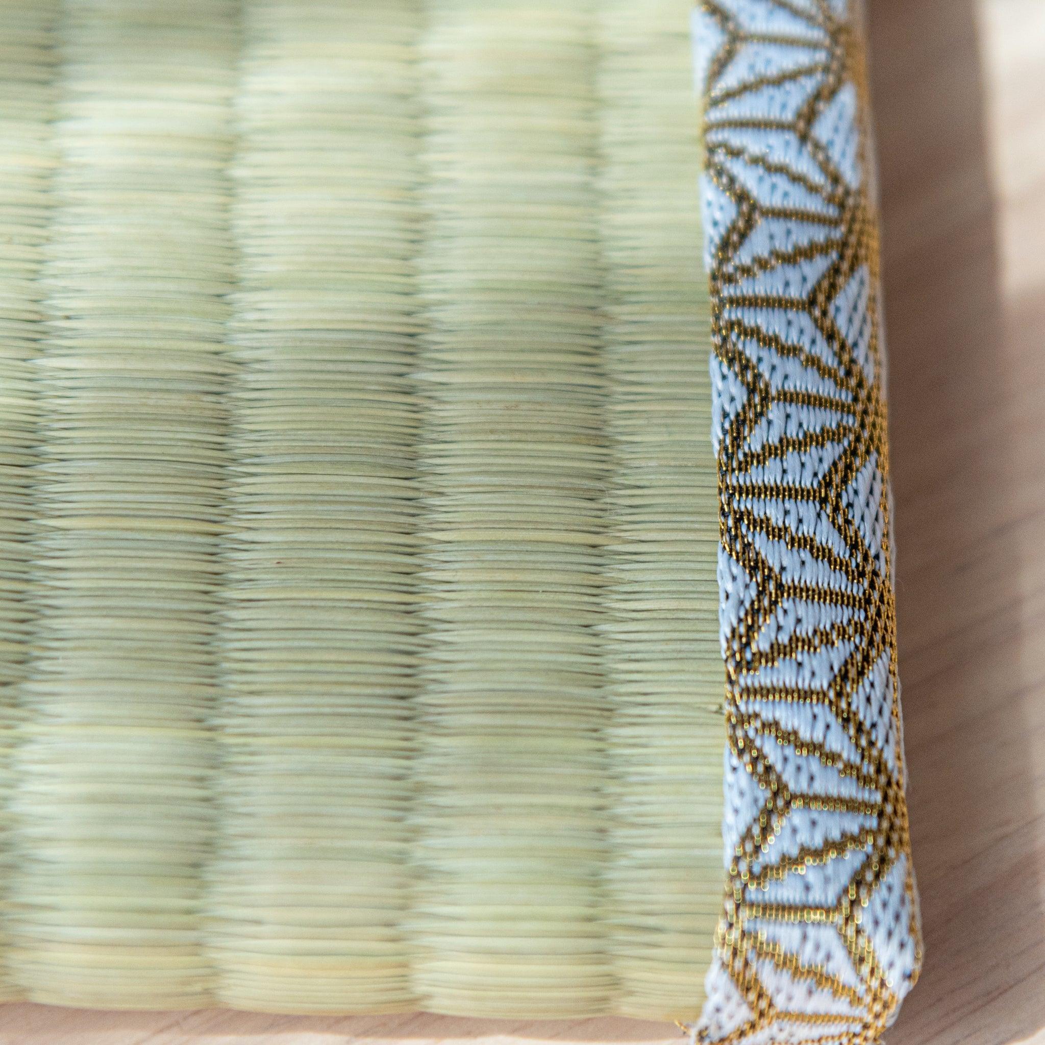 Minimalist flatlay of hemp leaves tatami pen tray with natural fibers and traditional Japanese asanoha design motif