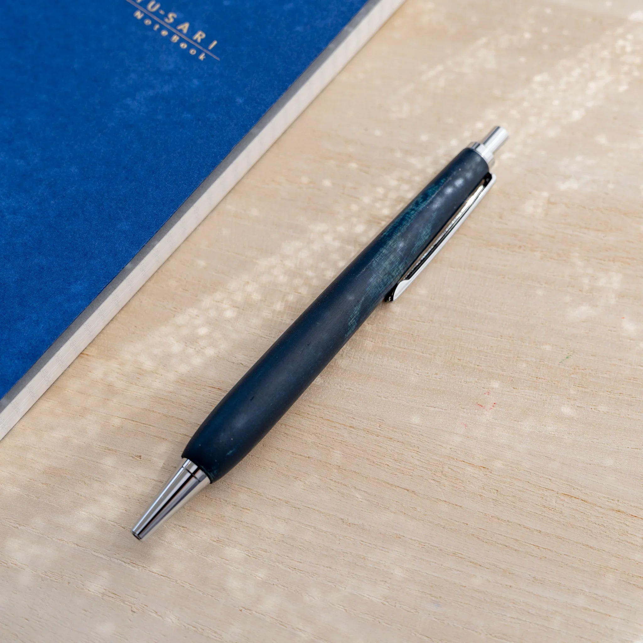 Horse chestnut wood urushi lacquered ballpoint pen in indigo blue, Japanese wood, silver knock and clip