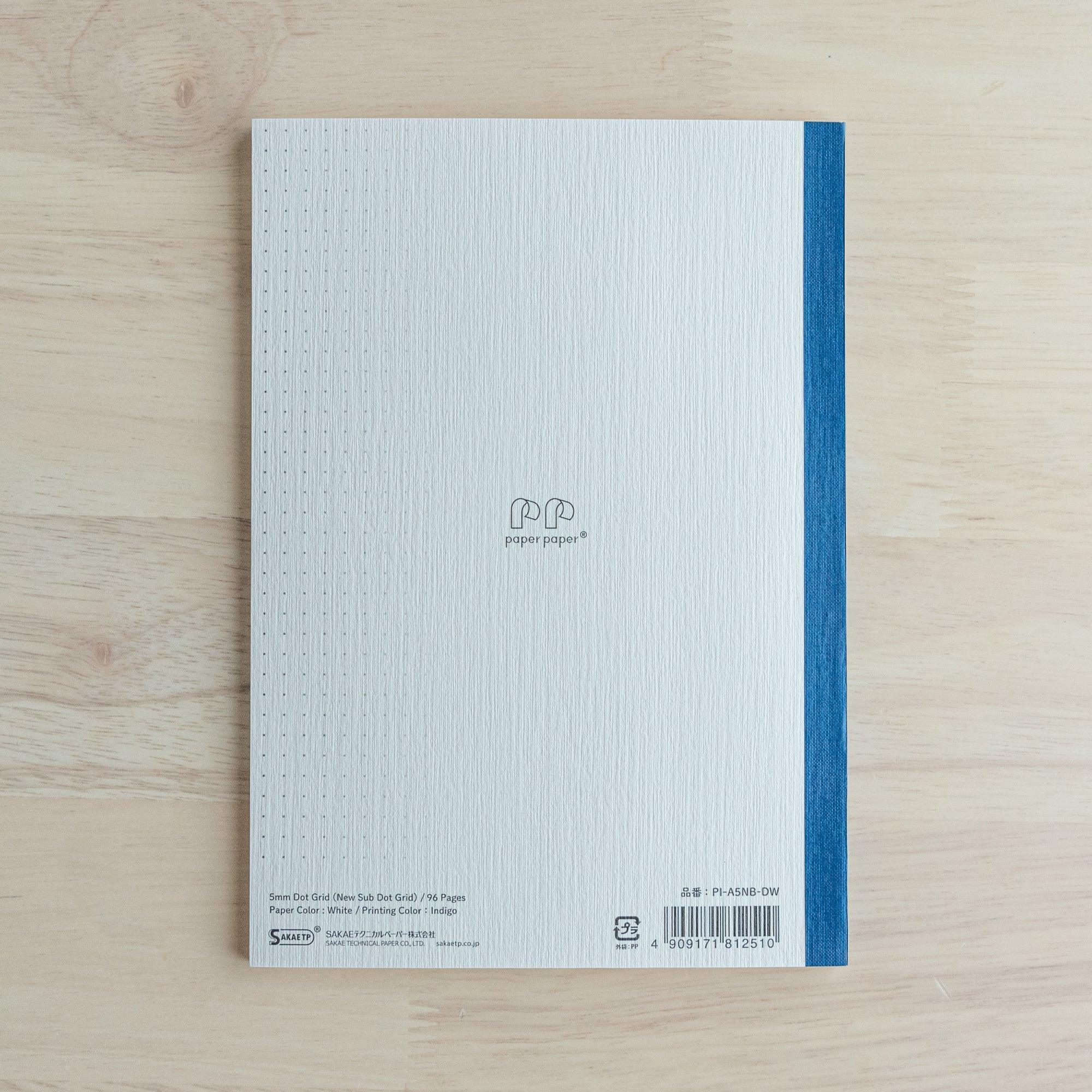 Iroful A5 indigo notebook with binding, angled spine view showing traditional binding and indigo color