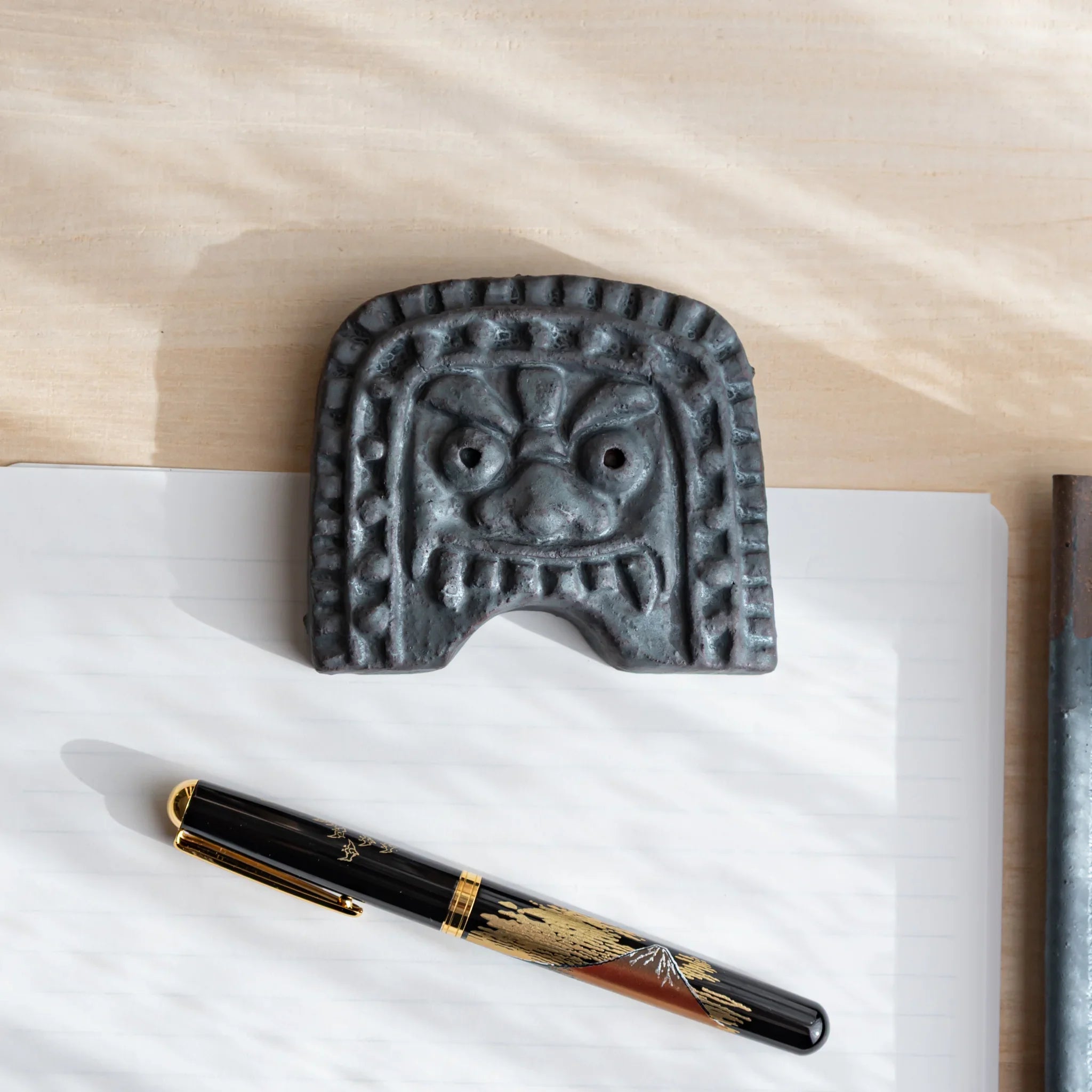 Japanese Kawara Roof Guardian Paperweight Medium square face front view showing guardian figure detail