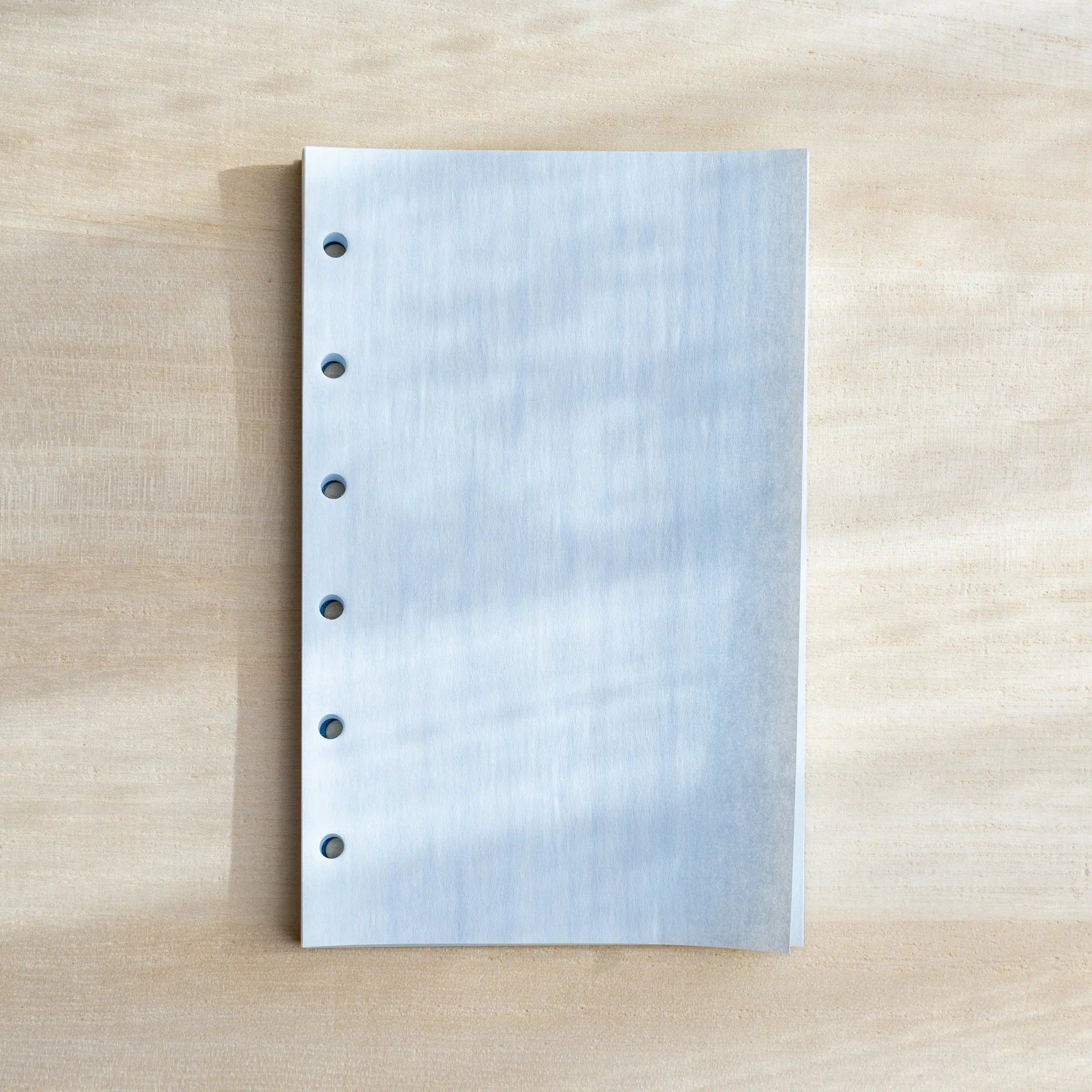 Kate Joe Onion Skin Planner Refill Mini 6 Size pale blue overhead perspective showing page thickness