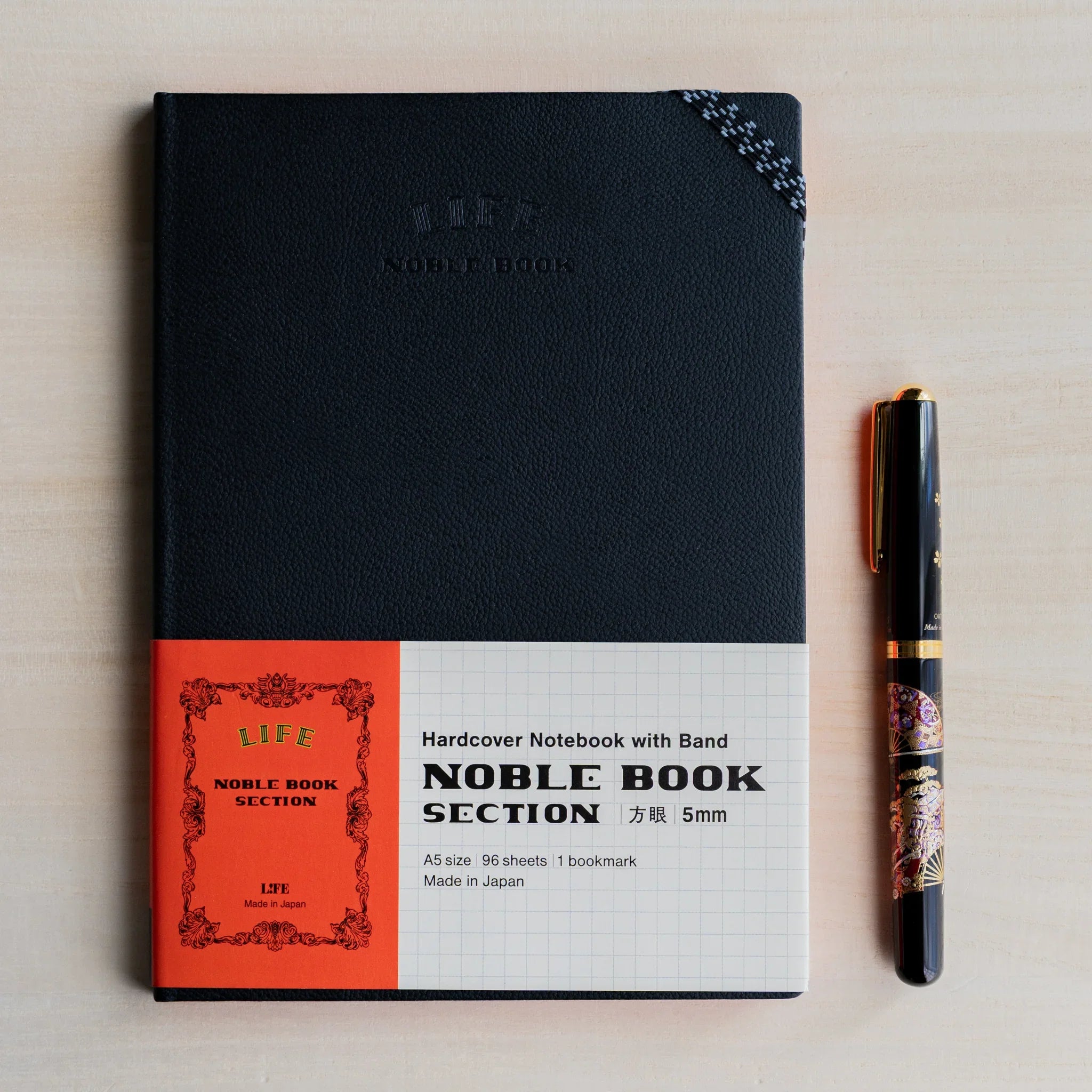 Life Noble A5 notebook featuring hardcover design, product photo highlighting closure mechanism, Japan