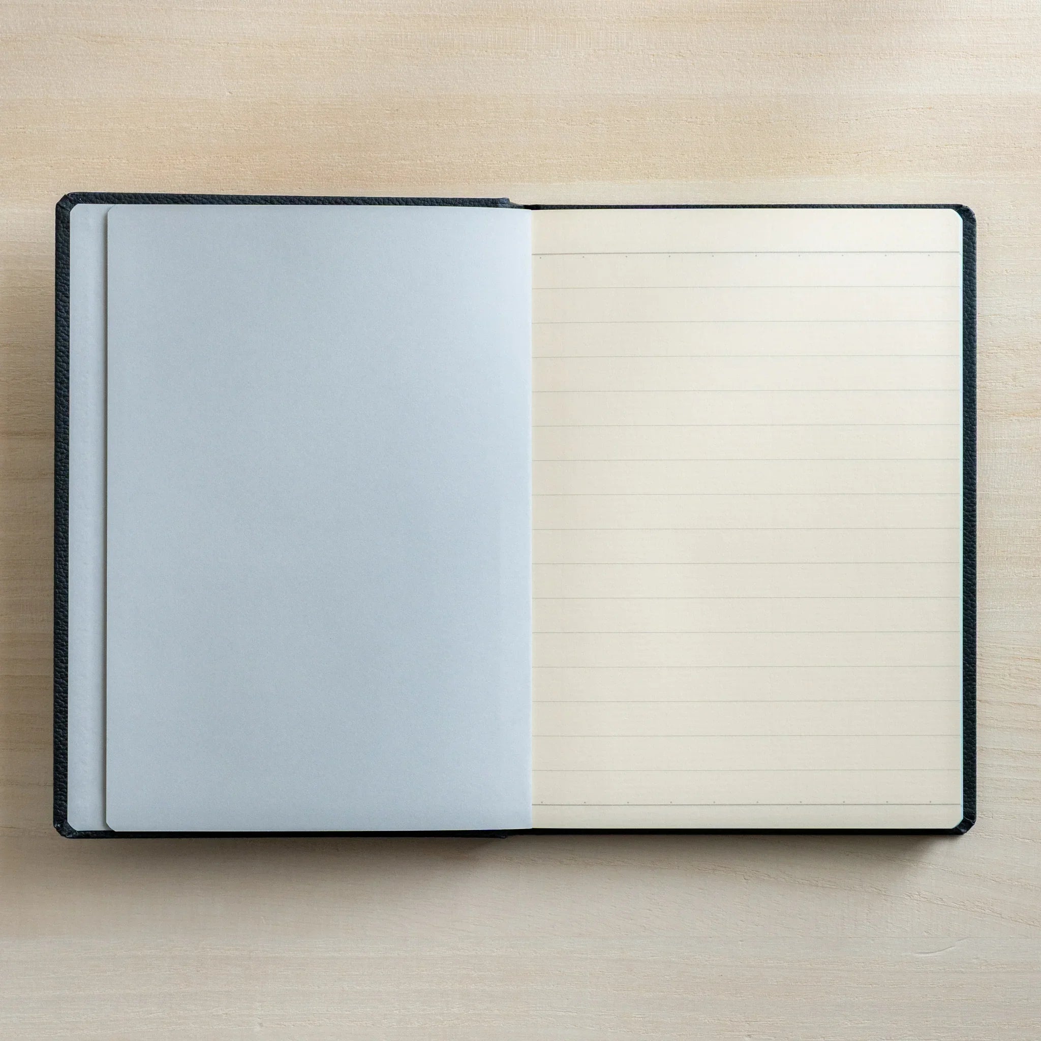 Life Noble A6 planning notebook, open view showing leather cover with spine visible