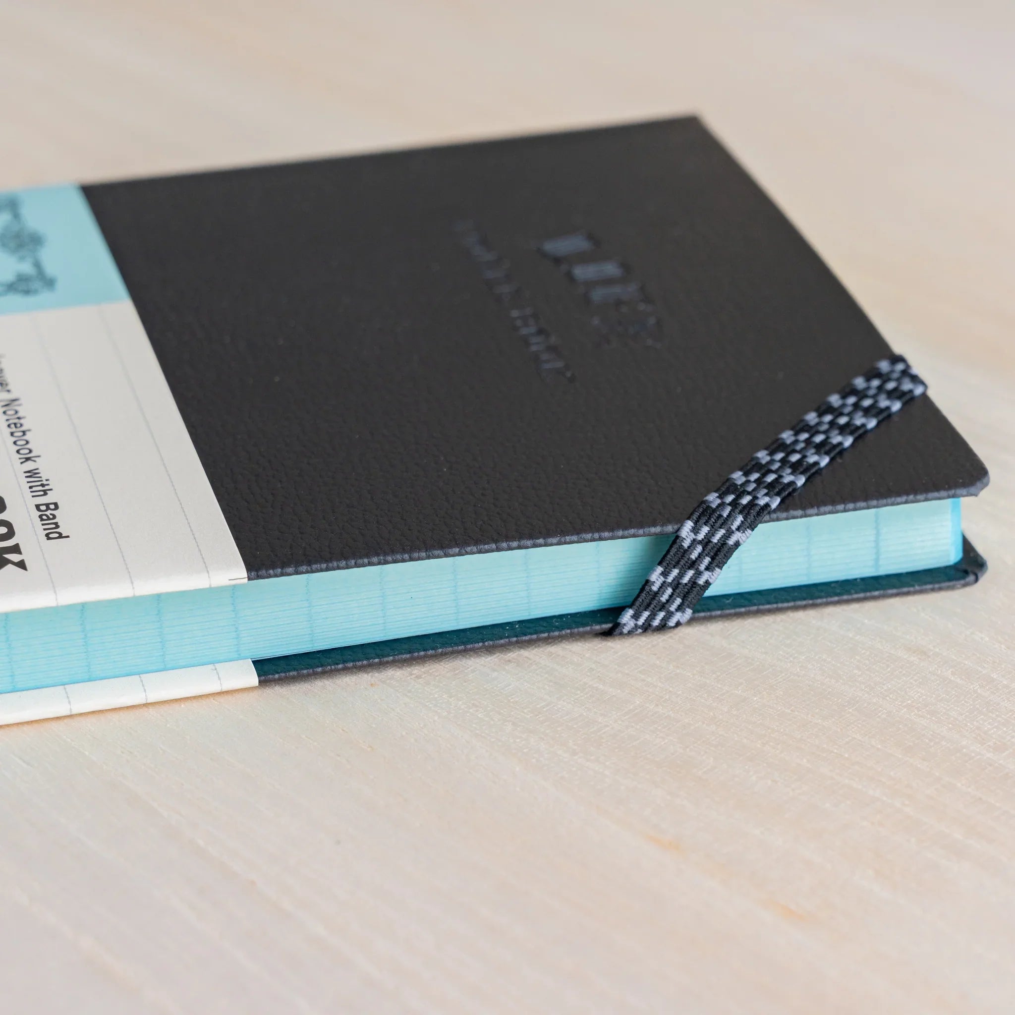 Life Noble A6 notebook featuring decorative cover, flat lay display highlighting spine visible