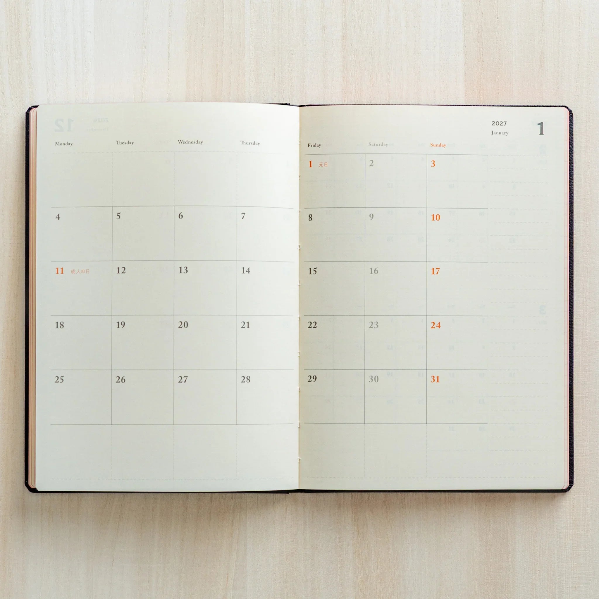 Life Noble planner for 2026, charcoal cover, closed cover showing highlighting gold foil embossing