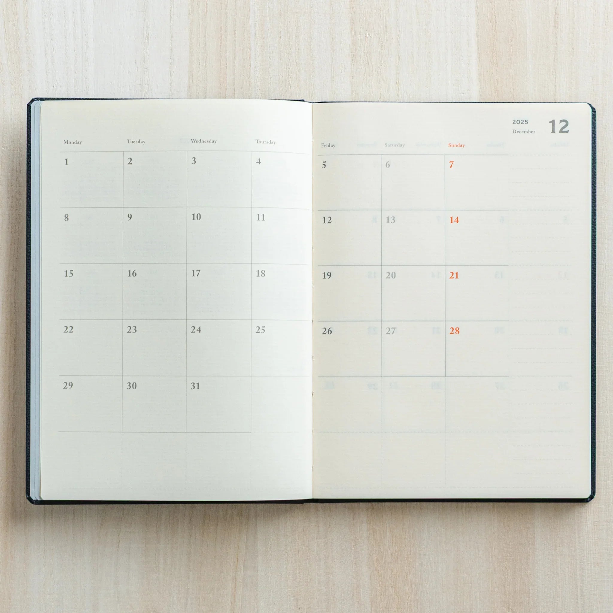 Life Noble 2026 schedule book, black leather cover, product shot highlighting leather, Japanese LIFE brand hardcover planner