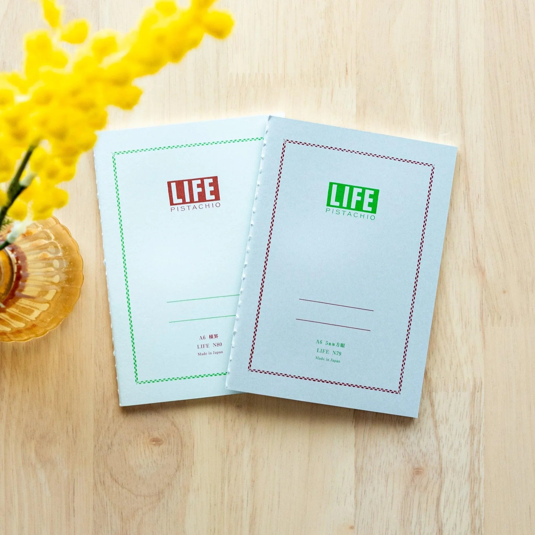 LIFE Pistachio A5 journal, stacked position showing cover thickness and green color saturation, LIFE Japan
