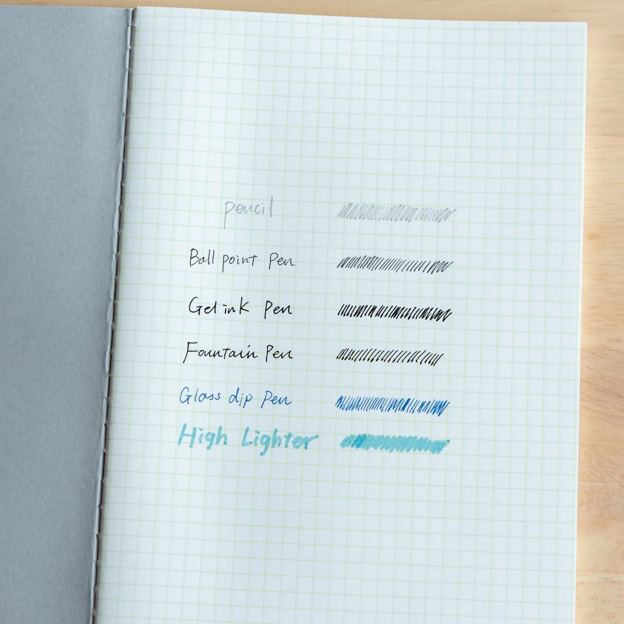 Pistachio green LIFE A5 journal, page corner detail showing fine paper thickness and binding quality