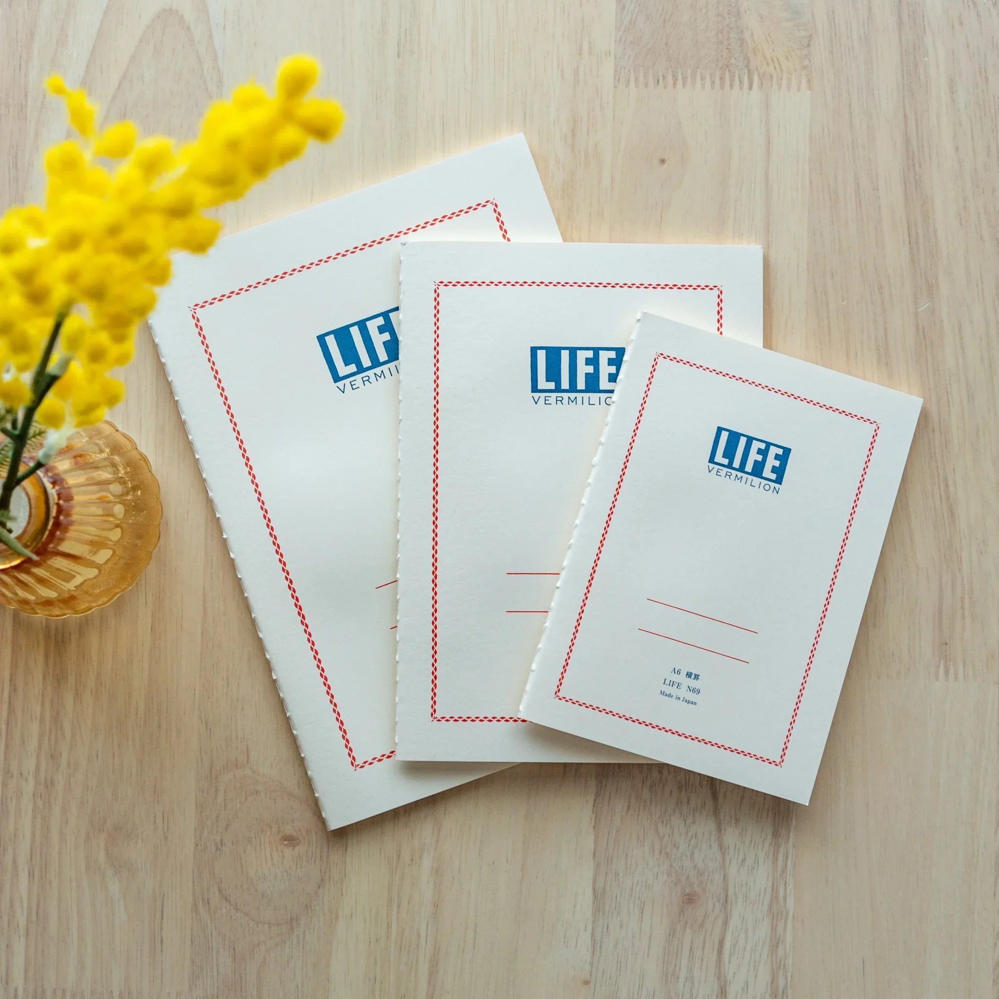 Vermilion quality traditional LIFE notebook with bold red and binding and paper pages with traditional Japanese craftsmanship