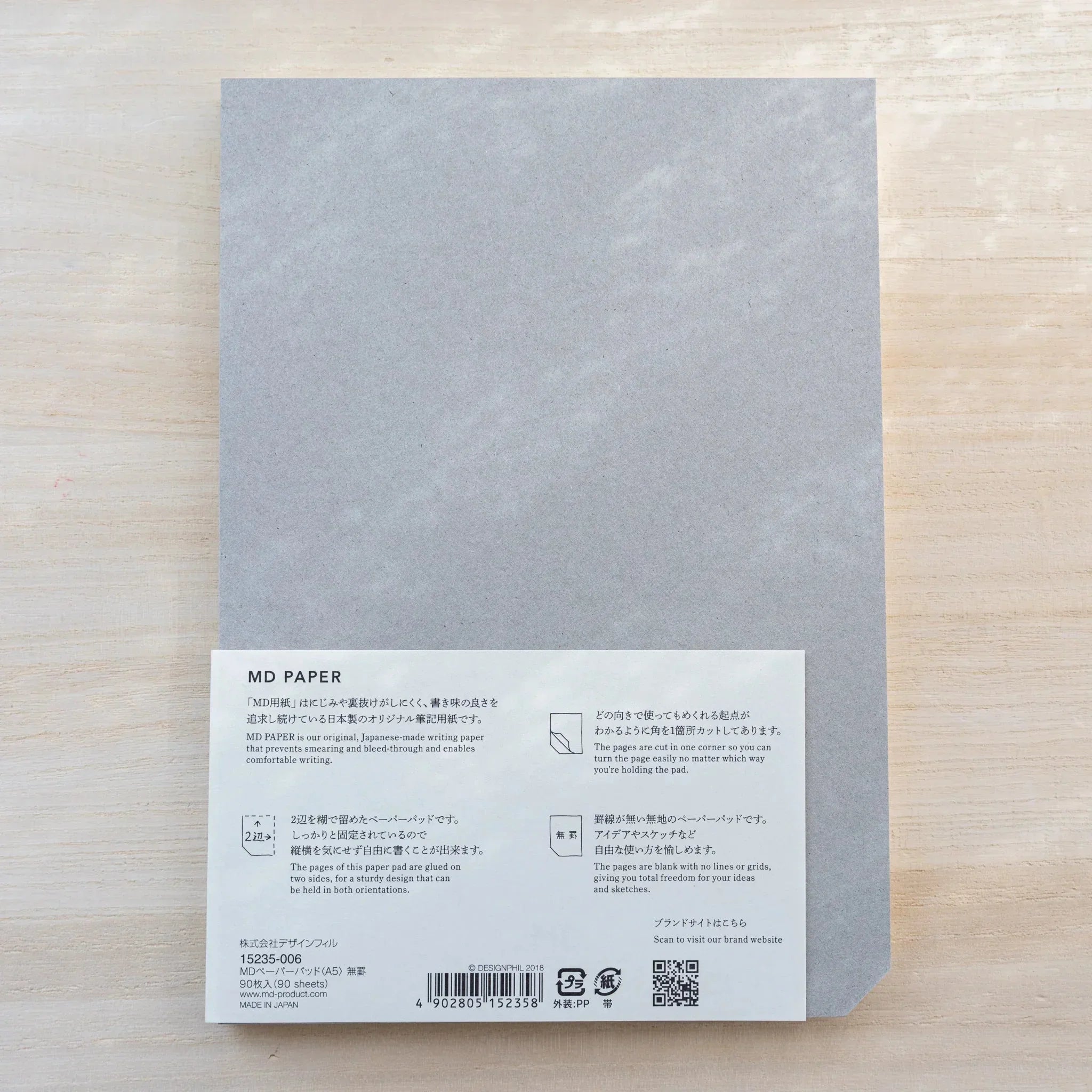 Midori MD Paper Pad A5 back with gray board and belly band detailing 90 sheets, glued two sides, and Made in Japan