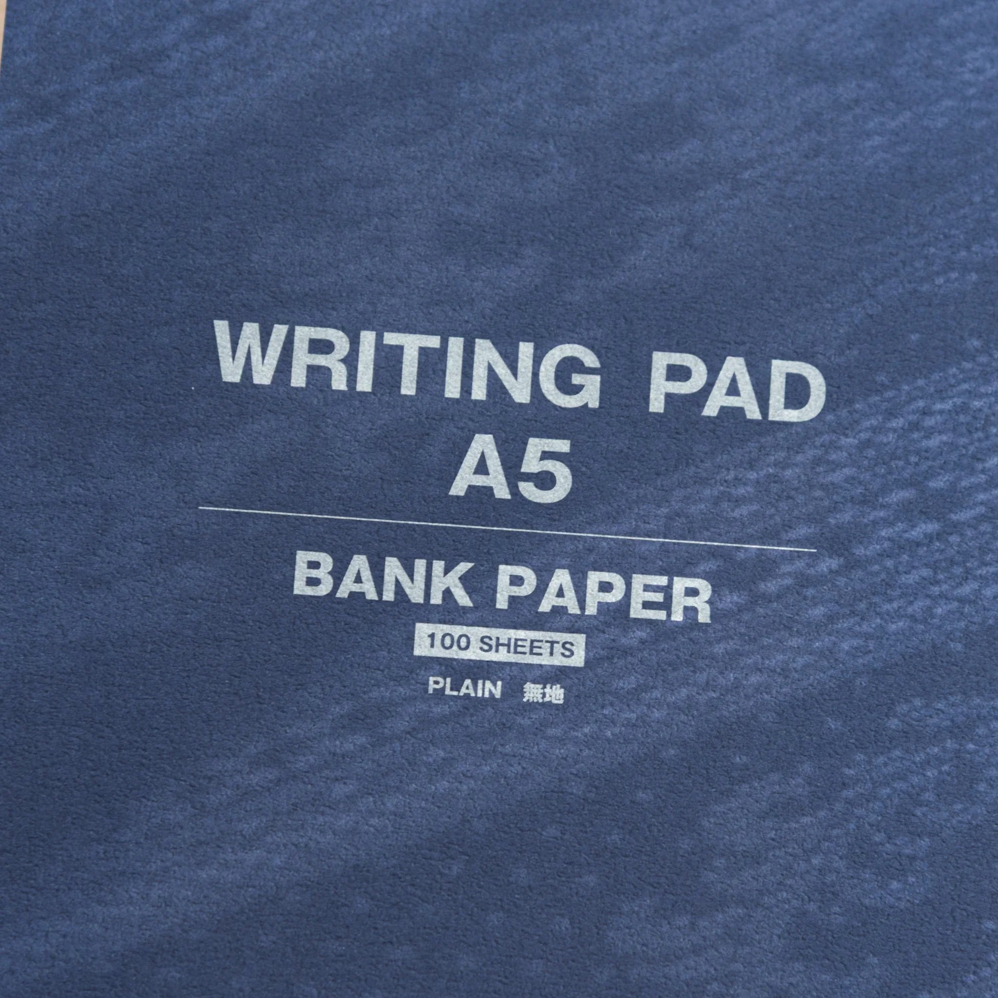 Mitsubishi Bank Ledger A5 pad shown from above displaying cover design and paper stack inside pad cover