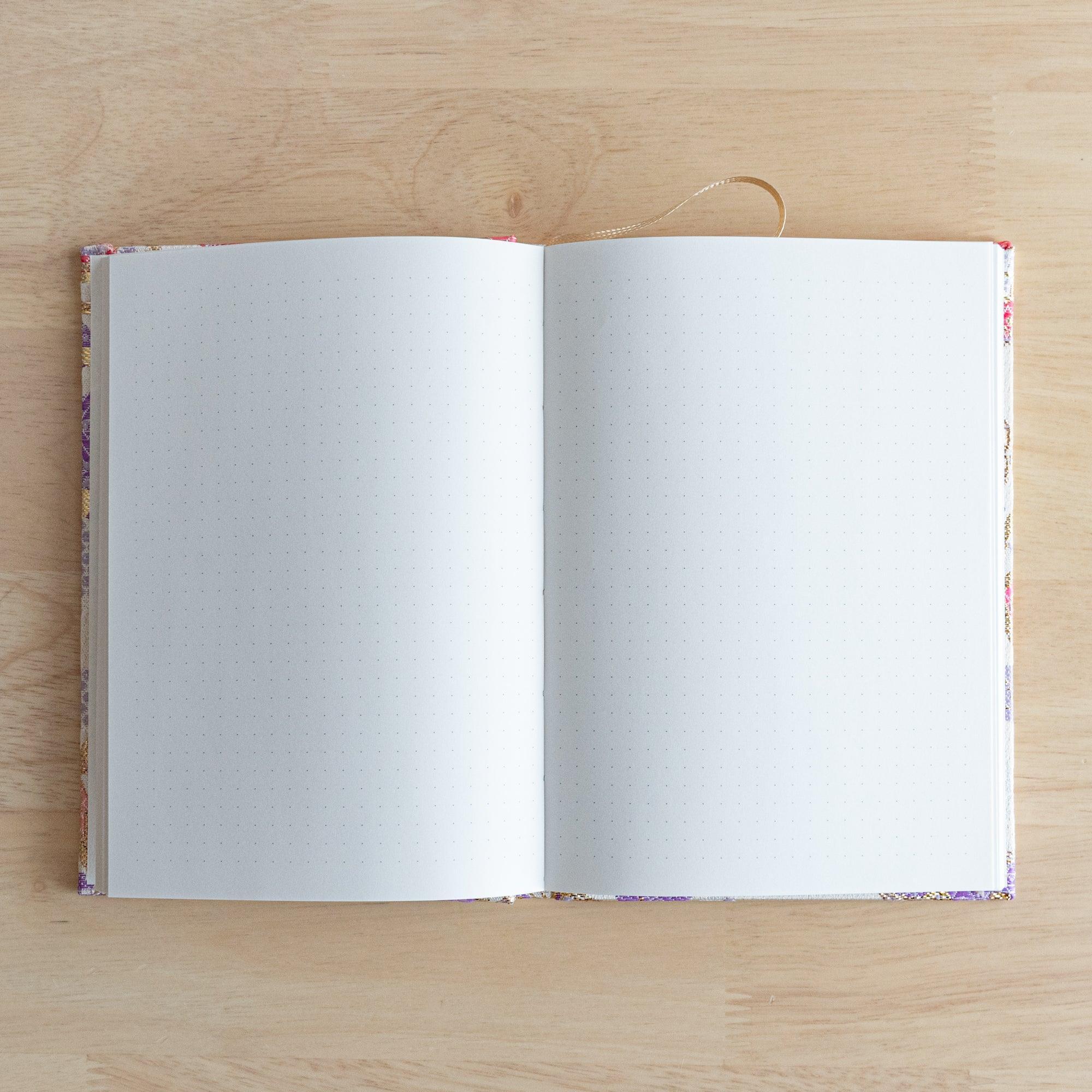 Nishijin textile B6 notebook, flat lay of traditional Sarkuta Temari brocade design detail with binding
