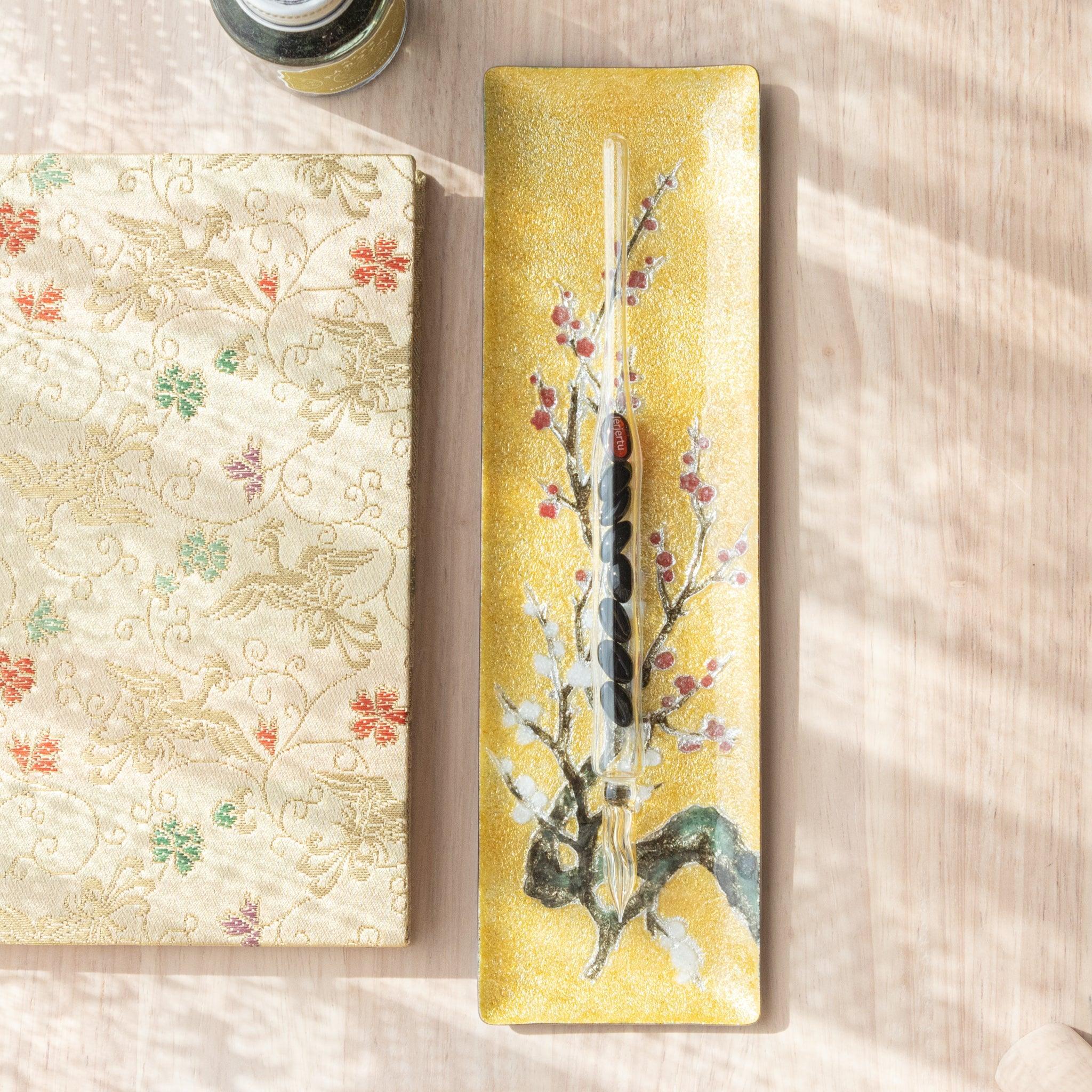 Plum Shippo Ware Medium Pen Tray featuring vibrant red plum flowers and black branches on yellow-gold cloisonné tray